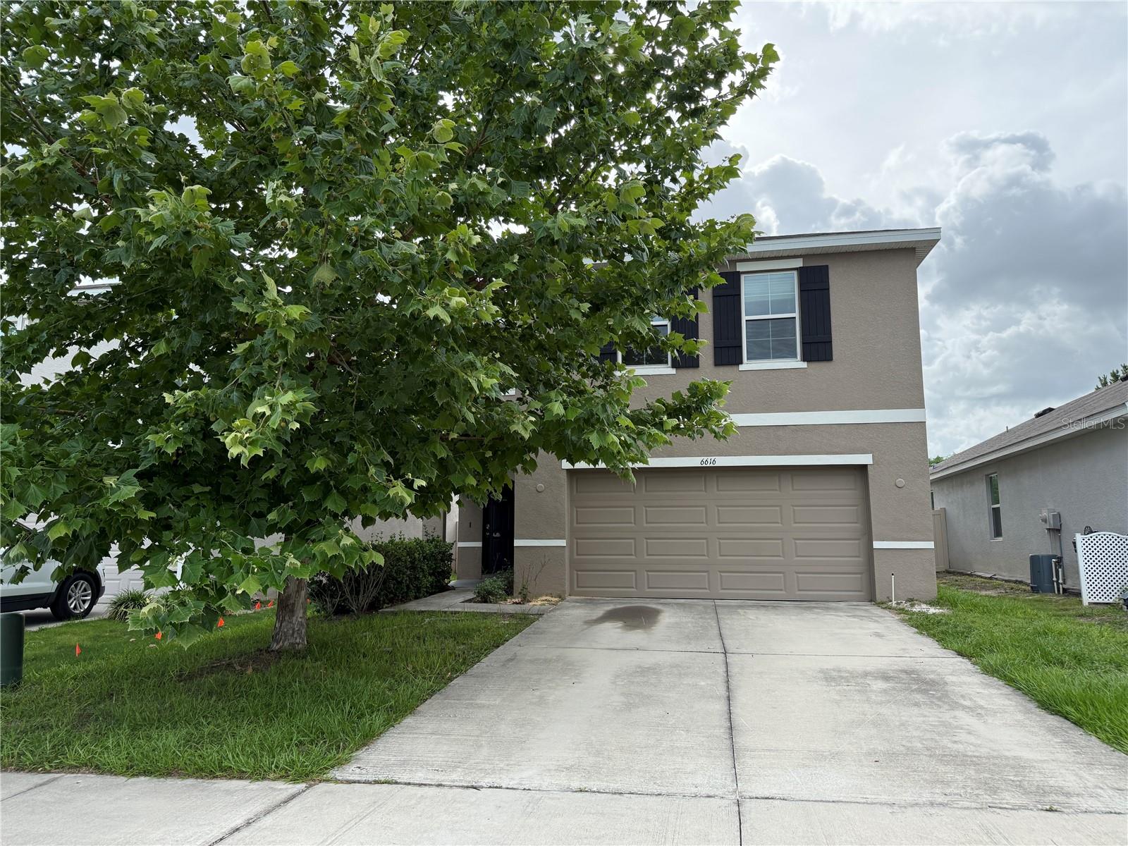 Spacious two-story home located in the desirable Sea Gate Village community offering great potential and ready for your personal touches! Offering 4 bedrooms, 2.5 bathrooms, and a 2-car garage, this spacious home features approximately 2,260 living square feet with an open and functional floor plan perfect for everyday living and entertaining. The kitchen overlooks the main living and dining areas, creating a seamless flow throughout the first floor. A convenient half bathroom is located downstairs for guests. All bedrooms, including the spacious primary suite, are located upstairs, providing privacy and separation from the main living spaces. This property is priced to sell fast, so call today to schedule your personal showing! This property may qualify for Seller Financing (Vendee).