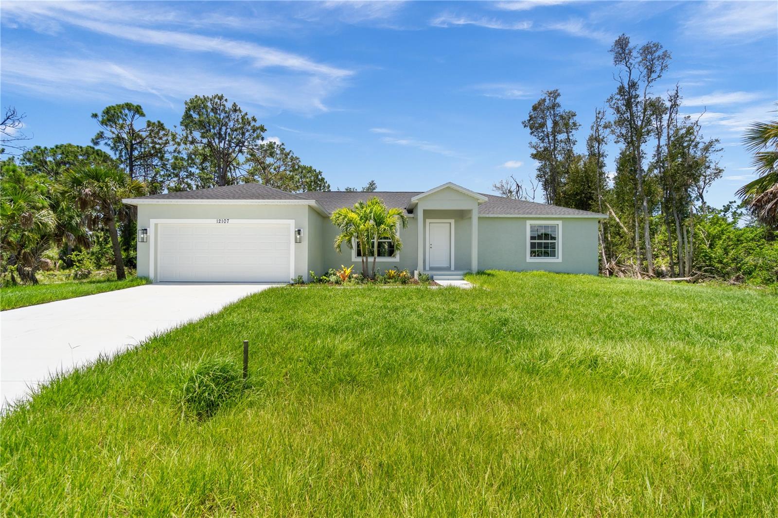 Located less than 9 miles from Manasota beach, this 3 Bedroom 2 Bath home features over 1600 square feet of livable space, stainless steel appliances included, vaulted ceilings, recessed lighting, plank-looking porcelain tile throughout & matching granite counter-tops in the kitchen and bathrooms. It's basically move-in-ready besides a washer and dryer! Plus, the included Hurricane shutters and up-to-date building specs will help to ensure your home insurance & utility bills are kept as low as possible. Other features include a 2 car garage with ceiling-mounted central air, which helps maximize garage storage, fans in every room and an open lanai at the rear of the home. Enjoy living just minutes away from the water and surrounding amenities, while still residing outside of a flood zone. No home-owners association, and no deed restrictions. Perfect for first time home buyers, families or those seeking to transition into something efficient and affordable. Don't miss out on this opportunity to own a brand new home in our beautiful area!