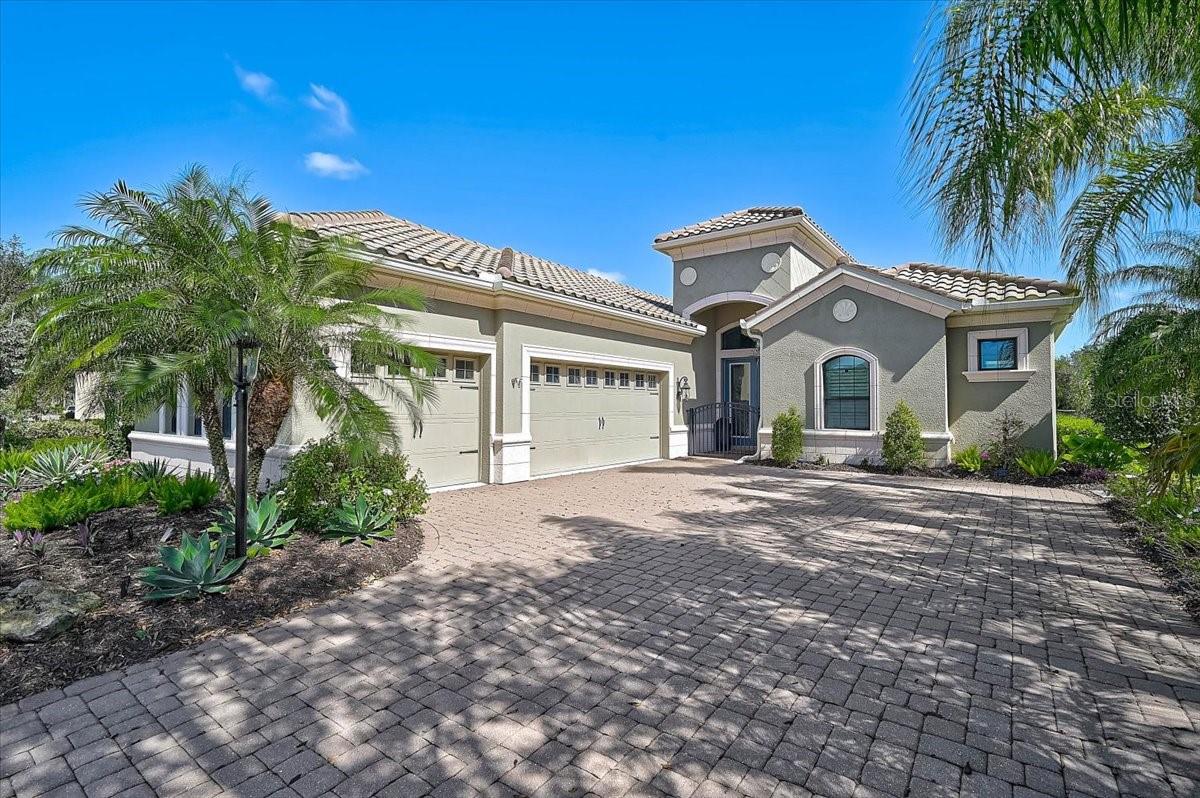 Welcome to 14911 Castle Park Terrace, located in the highly sought-after Country Club East at Lakewood Ranch, an established golf course community known for its luxury homes, mature landscaping, and prime location. Built by Neal Signature Homes, this standout residence offers 2,665 sq. ft., 3 bedrooms, 3 bathrooms, plus a dedicated office/den, along with a rare side-entry three-car garage that enhances both curb appeal and functionality. Inside, you’ll find a bright, open floor plan with high ceilings and upgraded finishes throughout. The spacious kitchen features a large center island, quality cabinetry, and flows seamlessly into the main living area perfect for entertaining or everyday living. Step outside and you’ll immediately see what sets this home apart. The beautifully upgraded lanai and pool area features a panoramic screen enclosure with peaceful pond and preserve views, creating a private, resort-style setting. Whether you’re relaxing in the spa or hosting guests, this outdoor space delivers the lifestyle buyers are looking for. Additional highlights include upgraded landscaping for enhanced curb appeal, a well-designed split floor plan for added privacy, a spacious primary suite with a clean, functional layout and en suite bathroom, and one of the guest bedrooms featuring its own en suite bathroom, ideal for visitors or multigenerational living. Located just minutes from Waterside Place and Main Street Lakewood Ranch, you’ll have easy access to top dining, shopping, golf, and entertainment all right at your fingertips. The backyard sells it, the rest just makes it easy to say yes. ??