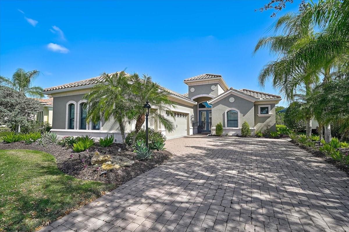 Welcome to 14911 Castle Park Terrace, located in the highly sought-after Country Club East at Lakewood Ranch, an established golf course community known for its luxury homes, mature landscaping, and prime location. Built by Neal Signature Homes, this standout residence offers 2,665 sq. ft., 3 bedrooms, 3 bathrooms, plus a dedicated office/den, along with a rare side-entry three-car garage that enhances both curb appeal and functionality. Inside, you’ll find a bright, open floor plan with high ceilings and upgraded finishes throughout. The spacious kitchen features a large center island, quality cabinetry, and flows seamlessly into the main living area perfect for entertaining or everyday living. Step outside and you’ll immediately see what sets this home apart. The beautifully upgraded lanai and pool area features a panoramic screen enclosure with peaceful pond and preserve views, creating a private, resort-style setting. Whether you’re relaxing in the spa or hosting guests, this outdoor space delivers the lifestyle buyers are looking for. Additional highlights include upgraded landscaping for enhanced curb appeal, a well-designed split floor plan for added privacy, a spacious primary suite with a clean, functional layout and en suite bathroom, and one of the guest bedrooms featuring its own en suite bathroom, ideal for visitors or multigenerational living. Located just minutes from Waterside Place and Main Street Lakewood Ranch, you’ll have easy access to top dining, shopping, golf, and entertainment all right at your fingertips. The backyard sells it, the rest just makes it easy to say yes. ??