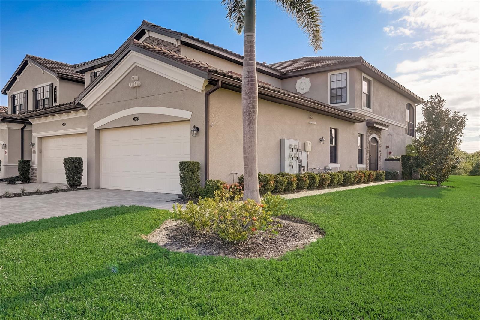 Indulge in luxury living with a stunning Condo home nestled in Lakewood National Golf Club in Lakewood Ranch, FL.
Crafted by Lennar Homes and boasting a Tuscan-themed architectural style, this spacious Coach Home offers a generous 1,786 square feet of living space, combining the feel of a traditional home with the convenience and benefits of condo living. With 3 well-appointed bedrooms and 2 full bathrooms, this residence is perfect for families or anyone seeking elegance and ease. The open layout connects the dining room, kitchen, and living room, creating a welcoming atmosphere for both entertaining and daily enjoyment. Sliding doors extend the living space to the impressive 22 ft x 10 ft lanai, providing ample room for outdoor dining and relaxation.  This Coach Home is enhanced with many upgrades. A few of the recently renovated kitchen upgrades include under cabinet lighting, white quartz countertops, large single bowl sink,  custom pull out shelving and LG French door refrigerator with 2 ice makers.   Many other touches throughout the home add to its modern appeal.
The owner’s suite is situated away from the secondary bedrooms, and features an en-suite bathroom and 2 walk-in closets. Custom plantation sliding door shutters lead to the porcelain-tiled lanai, offering a serene space for relaxation, conservation area views and occasional wildlife sightings.  You will be steps away from the Wake Forest Run Satellite Pool.  The guest bath and laundry room have been thoughtfully upgraded for convenience and style.  This home includes a full deeded golf membership to 2 Arnold Palmer designed courses. 
The Commander Course is home to the annual Suncoast Classic which is part of the Korn Ferry Tour. The Clubhouse serves as the community's focal point, offering elegant dining options. There is a resort-style Lagoon Pool with a poolside Tiki Bar.  Stay active with eight lighted Har-Tru tennis courts, four pickleball courts, two Har-Tru bocce courts, and a state-of-the-art fitness center open 24 hours.  The onsite Fitness Director and TPI Certified Personal Trainer, along with a variety of group fitness classes, are here to support your wellness journey.
Relax and rejuvenate at the full-service spa.  Enjoy the peace of mind provided by a professionally managed homeowners association, fully maintained lawns, and 24-hour gated security.  This Coach Home, enriched with thoughtful upgrades and situated in a community brimming with amenities, presents a lifestyle filled with luxury, recreation and community and is waiting for you!