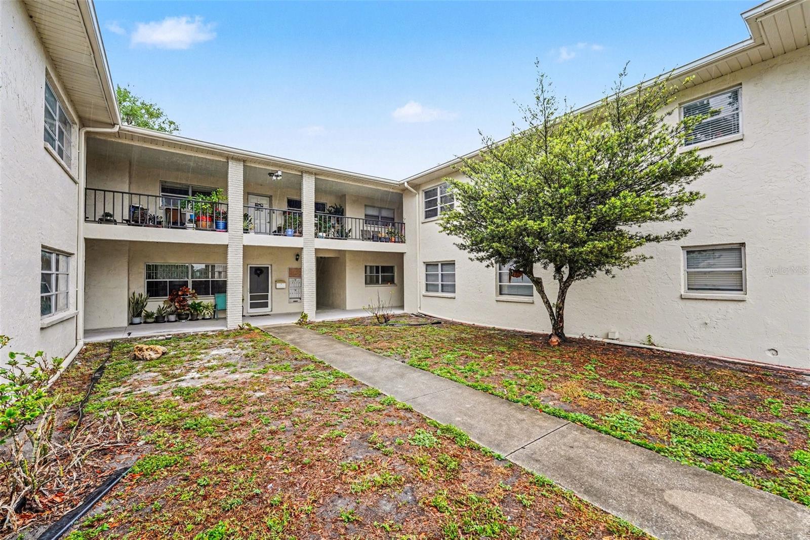 One or more photo(s) has been virtually staged. INVESTOR SPECIAL / COMPLETE RENOVATION OPPORTUNITY! Highly motivated seller has authorized a massive price improvement down to $50,000 for a quick cash close. This 2-bed, 2-bath ground-floor corner unit is a blank canvas waiting for an investor to come in, renovate to their exact specifications, and either hold as a long-term rental or resell. The community allows 1-2 year minimum leases. Monthly HOA covers water, trash, and sewer. Incredible walkability—just steps to Park Plaza and a short drive to the beaches. Bring your best cash offer; this is an absolute giveaway priced to move immediately and sold As-Is!