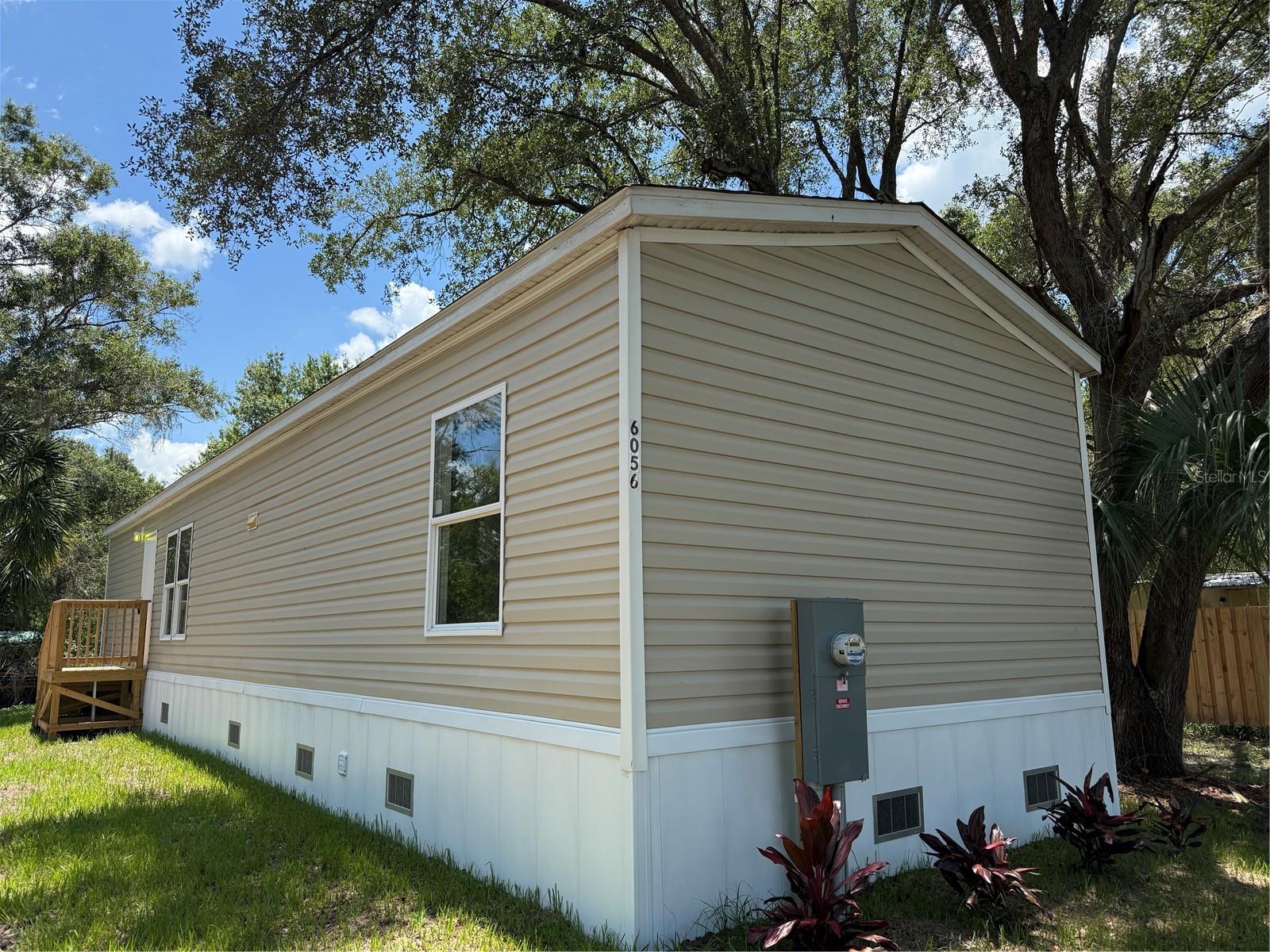 Welcome to this beautifully maintained new (2024) 2-bedroom, 2-bath mobile home nestled in a quiet county neighborhood. Offering the perfect blend of comfort and privacy, this home features an open-concept living area filled with natural light, a spacious kitchen with modern cabinetry and ample counter space, and a split-bedroom layout ideal for added privacy.

The primary suite includes a private bath and generous closet space, while the second bedroom and full bath provide flexibility for guests, family, or a home office. Enjoy peaceful country living with room to relax, garden, or entertain outdoors. 

Whether you’re looking for a starter home, downsizing, or seeking an investment opportunity, this move-in-ready home offers affordable living in a serene setting while still being convenient to town amenities.
“One or more photos have been visually altered/landscaped”