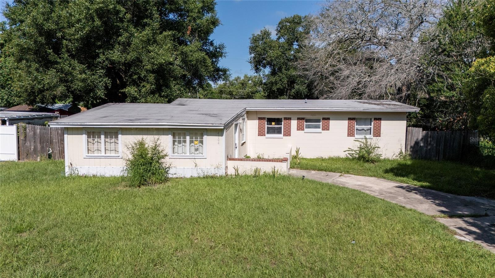 Spacious single-family home in Orlando featuring 3 bedrooms and 1.5 bathrooms with 1,268 Sq Ft of living space situated on a generous 10,136 Sq Ft lot with a spacious backyard — perfect for outdoor enjoyment and entertaining. The home features hard flooring throughout, central air conditioning, and a dedicated laundry area with washer/dryer connections conveniently located just outside the kitchen. Additional storage space adds to the everyday functionality of this home. A great opportunity for homeowners and investors alike. Schedule your showing today!