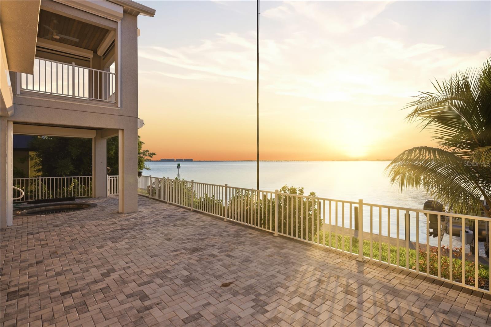Welcome to an extraordinary waterfront residence where timeless design, exceptional craftsmanship, and the coveted Punta Gorda lifestyle come together. Built in 2024 by West Coast Builders, this custom home offers nearly 4,400 square feet under air (4,393 sq. ft.) and has been thoughtfully designed to maximize comfort, elegance, and breathtaking harbor views.
Perfectly positioned on 80 feet of direct Charlotte Harbor frontage, this sailboat-access property offers no bridges to open water, making it a dream location for avid boaters and anglers alike. From your backyard, set out for world-class fishing, leisurely cruises, waterfront dining, or adventures into the Charlotte Harbor and beyond to the Gulf of America.
Inside, every detail reflects quality and sophistication. All three generously sized bedrooms feature private en-suite baths, providing comfort and privacy for family and guests. The upper-level primary retreat is a sanctuary of its own, complete with an expansive walk-in closet, elevator access, and a spacious private balcony where panoramic views of the harbor and the charming skyline of Punta Gorda create the perfect backdrop for morning coffee or spectacular sunrises.
The oversized two-car garage boasts extra-high ceilings that may possibly accommodate a vehicle lift, offering flexibility for collectors or hobbyists. Throughout the home, luxury finishes, storm-rated windows, and roll-down hurricane protection provide both beauty and peace of mind.
Life here extends far beyond the property lines. Residents enjoy the renowned boating culture, vibrant downtown restaurants and shops, waterfront parks, pickleball and tennis facilities, and numerous nearby golf courses that have made Punta Gorda Isles one of Southwest Florida’s most sought-after waterfront communities.
This is more than a home—it's an invitation to embrace an exceptional coastal lifestyle where every day begins and ends with the beauty of the harbor.