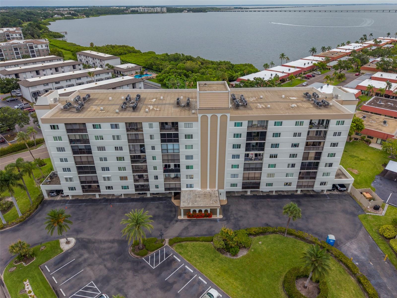 Welcome to Imperial Cove, a sought-after 55+ gated waterfront community overlooking beautiful Tampa Bay. This top-floor 2-bedroom, 2-bathroom condominium offers stunning bay views and a desirable split-bedroom floor plan, providing privacy and comfort for residents and guests alike. The unit has been tastefully updated with a newer kitchen featuring stainless steel appliances, solid surface countertops, and ample cabinet space. The spacious living and dining areas are filled with natural light and take full advantage of the impressive waterfront vistas. Residents of Imperial Cove enjoy an array of resort-style amenities, including a heated waterfront pool, clubhouse, fitness center, fishing dock, shuffleboard courts, and beautifully maintained grounds designed for an active and social lifestyle. The unit also includes a covered parking space and private storage area for added convenience. Ideally located near shopping, dining, airports, and the award-winning Gulf Beaches, this home offers the perfect combination of relaxation and accessibility. Rent includes water, sewer, trash, cable, internet, and all utilities except electricity. Don't miss this opportunity to enjoy waterfront living in one of the area's most desirable 55+ communities. Schedule your private showing today!