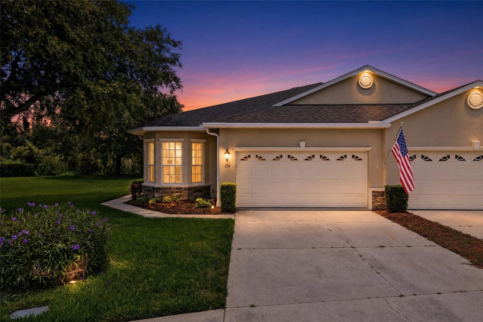 Welcome to 134 Lower Lake Ct , tucked at the end of a quiet cul-de-sac, this beautifully maintained villa offers the privacy and tranquility you've been searching for. Set within the gated Lakeside enclave of DeBary Country Club, the home backs to serene lake and greenbelt views — a peaceful, natural backdrop you'll enjoy every single day from your private screened lanai, complete with stylish paver flooring.  Step inside and you'll immediately notice the bright, open layout bathed in natural light, courtesy of four solar tubes that keep the interior warm and welcoming throughout the day. Best of all — no carpet anywhere, just beautiful ceramic tile and wood plank tile flooring flowing throughout the entire home. Upscale finishes elevate every room, including granite countertops, crown molding, stainless steel appliances, and custom blinds on the sliders. A versatile bonus room rounds out the floor plan, offering the flexibility to serve as a home office, den, or potential third bedroom — whatever your lifestyle calls for. Practical updates bring true peace of mind: the roof was replaced in 2020, the HVAC system updated in 2021 and the entire interior painted in 2023, making this home genuinely move-in ready with years of worry-free living ahead. Beyond your front door, DeBary Country Club delivers a resort-style lifestyle unlike any other. The community features nightly security patrols, video surveillance, and walkable sidewalks throughout — all within a welcoming, golf cart-friendly neighborhood. At the heart of it all is a Golf Digest 4-Star Rated, 18-hole championship course that has hosted U.S. Open qualifiers, along with six lighted tennis courts, pickleball courts, a swimming pool, and a fitness center. Whether you're teeing off, rallying on the courts, or simply cruising the neighborhood on your golf cart, there is always something to enjoy. Centrally located in DeBary, you'll also have quick access to scenic bike trails, shopping, medical facilities, and the SunRail station — putting both nature and the city well within reach. This is the low-maintenance, high-lifestyle retreat you've been waiting for. Schedule your private showing today and experience firsthand the perfect harmony of comfort, quality, and community that 134 Lower Lake Ct has to offer.