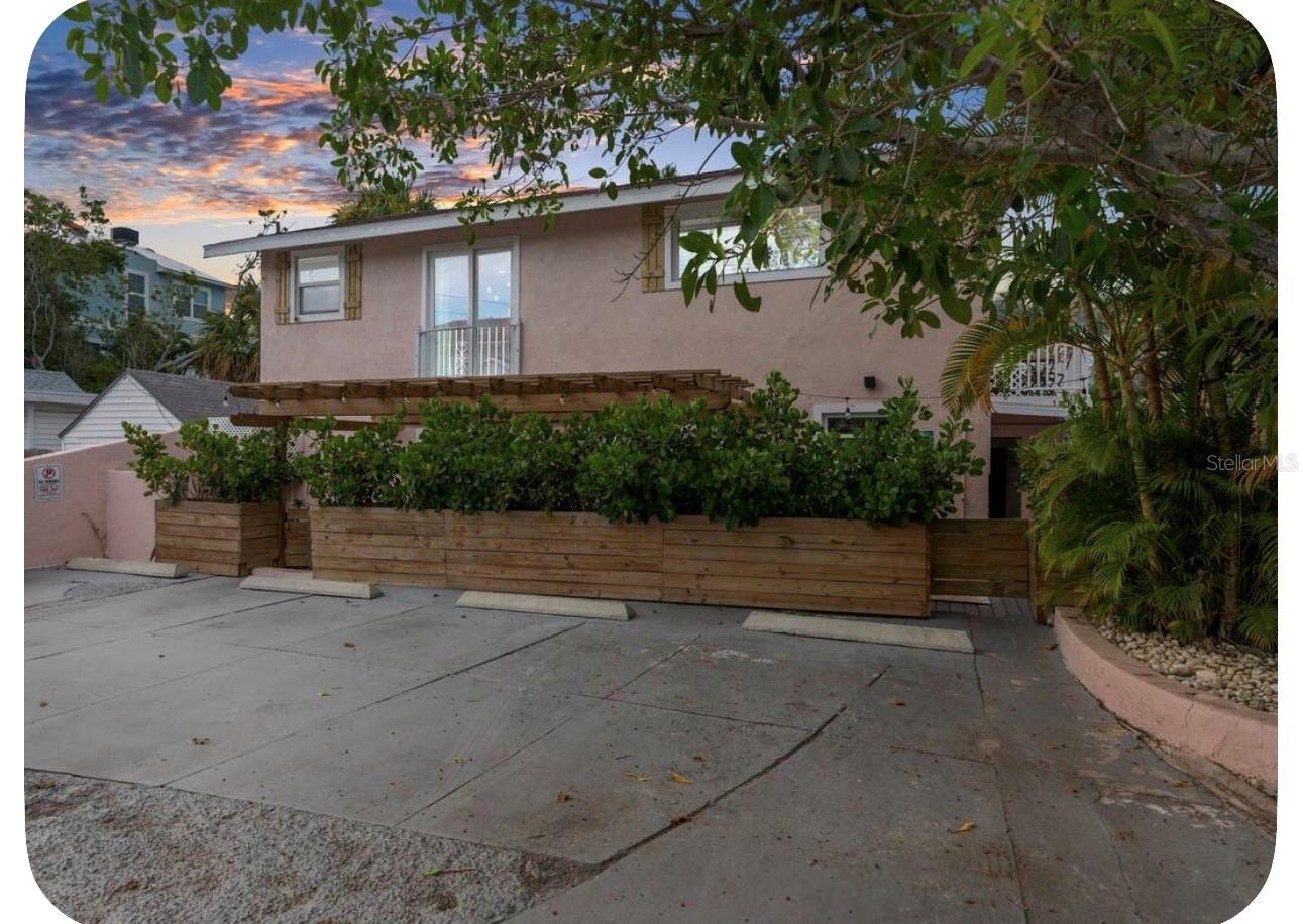 Located in the heart of highly sought-after Sunset Beach, this rare tri-plex opportunity is just a 2-minute walk to the beautiful white sands of Sunset beach and surrounded by the laid-back beach lifestyle that makes Treasure Island so special. Walk to local beachfront restaurants, live music, coffee shops, bars, and entertainment, while enjoying one of the most charming and walkable beach communities on Florida’s Gulf Coast. Previously operated as a highly successful short-term rental property, this unique beach compound consists of three separate units, including a main building with two apartments plus a detached standalone efficiency unit — offering endless possibilities for redevelopment, investment, vacation use, or future income potential. The property sustained flood damage during Hurricane Helene and wind damage during Hurricane Milton and is currently vacant and in disrepair. This is being marketed primarily for its exceptional location, lot value, and redevelopment potential. Renovate and reimagine the existing structures, elevate the property approximately 12 feet to create a future coastal retreat, or start fresh with brand-new construction. Opportunities like this in Sunset Beach are increasingly rare. This location places you minutes from everything beach living has to offer — waterfront dining, boating, fishing charters, dolphin cruises, parasailing, jet ski rentals, beach bars, live entertainment, and nightly sunsets over the Gulf. Whether you envision a luxury beach getaway, income-producing investment property, or a completely new coastal development project, the potential here is truly unmatched. Bring your vision and take advantage of this incredible opportunity to create something special in one of Tampa Bay’s most beloved beach communities. Photos of the exterior were taken prior to the hurricanes.