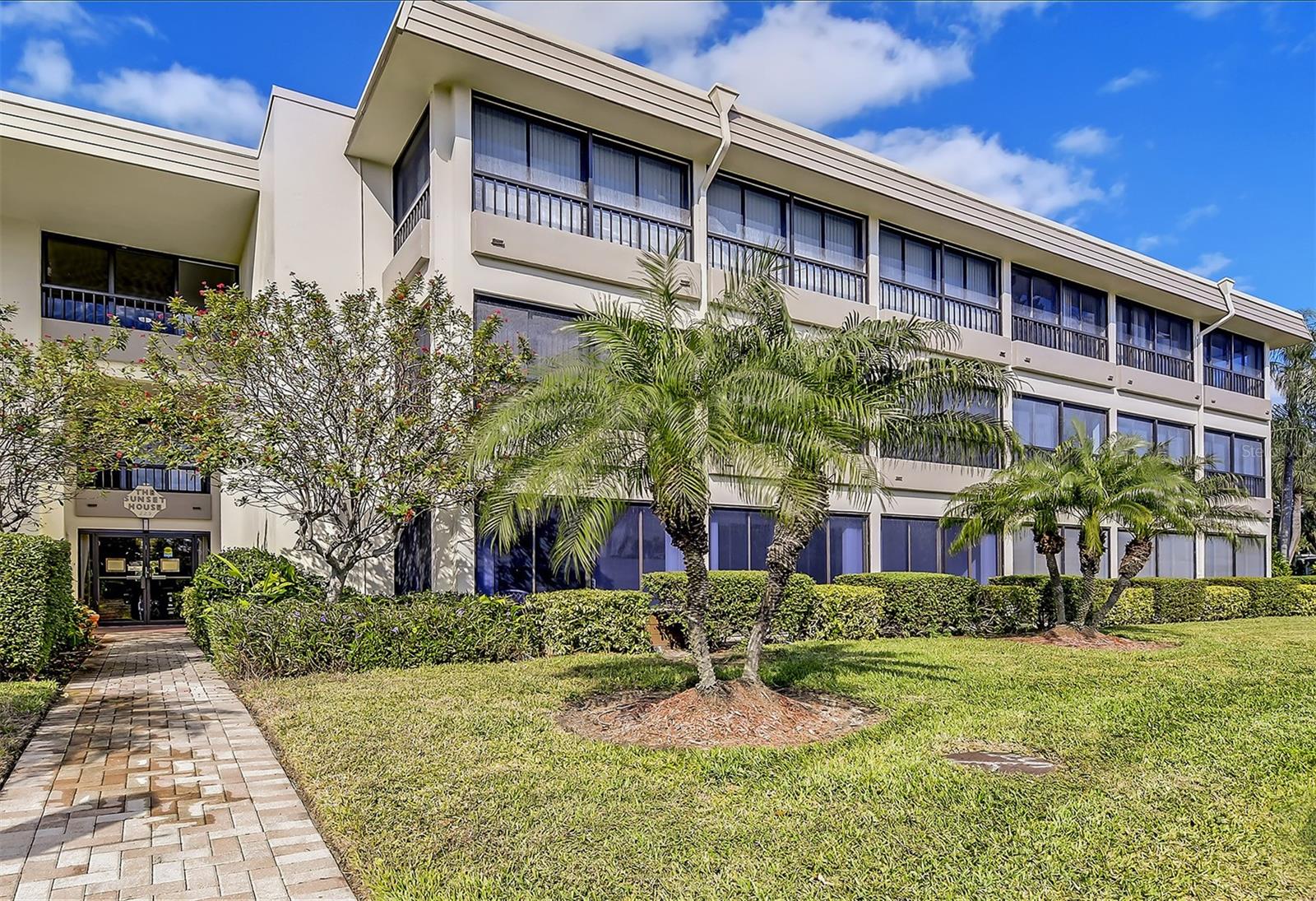3RD FLOOR FLOODPROOF CORNER UNIT TOP FLOOR PENTHOUSE PRIVATE BEACH RESORT APPROX.1,665 sf. The Treehouse at Beautiful Whispering Sands Siesta Key the World's Finest White Sand Beach. This is a unique opportunity to own a rare corner unit on the green belt Not a Parking Lot View, double Lanai flood proof no damage from Hurricanes. The breeze you get going through this condo is incredible, also there is brand new AC unit for the hotter months this is a must see condo. 800 ft of PRIVATE BEACH two private heated pools Clubhouse workout facility and more.