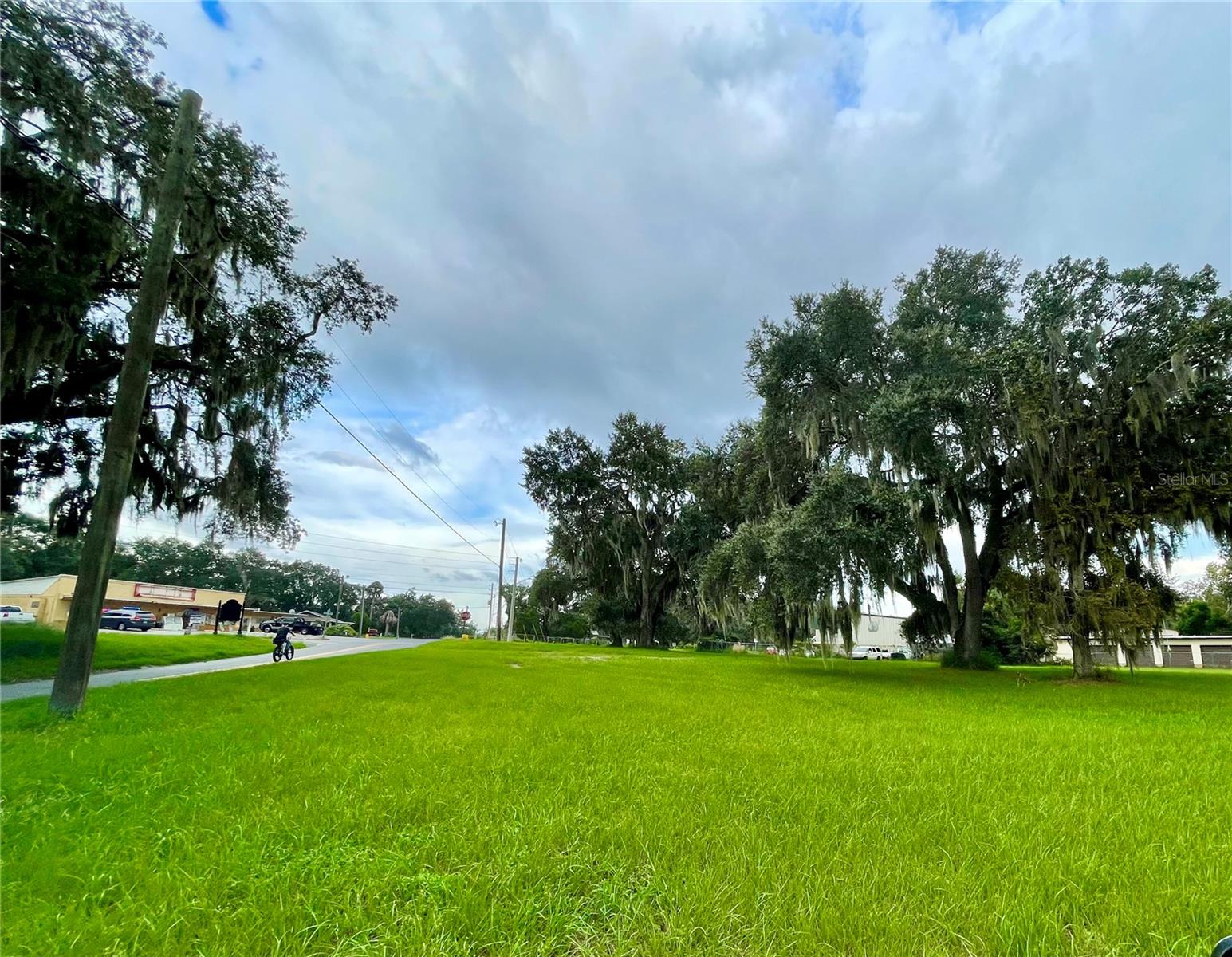 Offering is for a 2.33+/- Acre corner zoned PUD with FLU / Future Land Use of Industrial. This busy corner property is an assemblage of 3 parcels Lake Co FL alt key's # 3313071, 1173752 & 1741041. Site has 203'+/- Ft on Montclair Rd & 123'Ft on  busy Thomas Ave. Site is an hour from Orlando and just minutes to The Villages, Florida's Turnpike, I-75 US Hwy 441, 301 & 27. Site is within the city of Leesburg. FDOT shows 9,100 Avg Trips per Day at this busy location.  All information is believed accurate and correct but not guaranteed or warranted and subject to change without notice.   Bring your builder and lets walk the site.