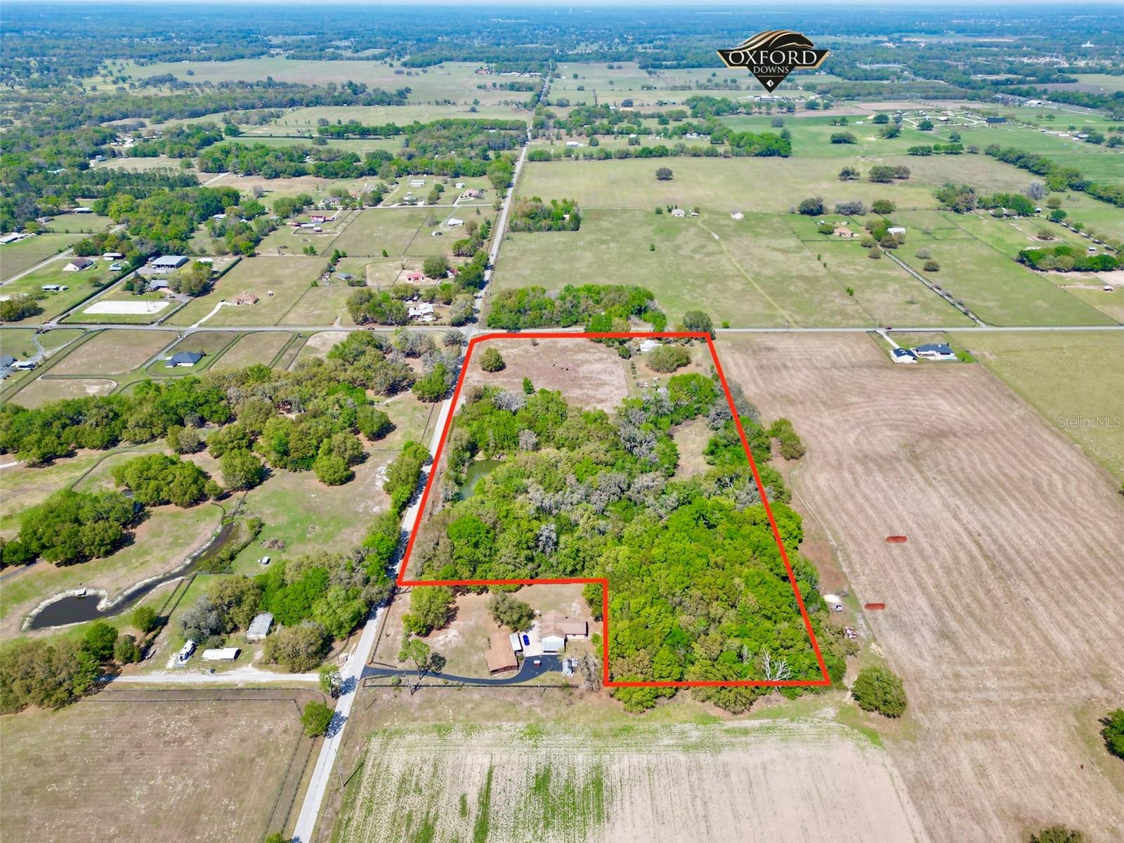 17 acres of Vacant Land | Aquaculture + Residential Zoning | Spring-Fed Pond | Future Growth Potential

Unlock the potential of this unique and versatile property located in the rapidly growing area of Oxford, Florida. Offering multiple zoning opportunities including Aquaculture and Residential, this property presents an exceptional investment for those looking to build, develop, farm, or secure land with long-term upside.

Set on a beautiful parcel featuring a spring-fed pond, the property offers both natural beauty and functional value. Whether you envision a private homestead, agricultural use, aquaculture operation, or future rezoning opportunity, this property provides the flexibility to bring your vision to life.

Infrastructure advantages are already in place with two wells on site, making the property ideal for agricultural or specialty use. The presence of water sources, combined with existing zoning allowances, makes this parcel especially appealing for buyers seeking land that is both usable today and positioned for tomorrow’s growth.

Located just minutes from major roadways and the continued expansion surrounding The Villages & Ocala, this property sits in an area experiencing strong development momentum—making it an ideal candidate for future rezoning or investment potential.

Whether you're an investor, developer, agricultural user, or someone looking to create a private retreat, opportunities like this are becoming increasingly rare.