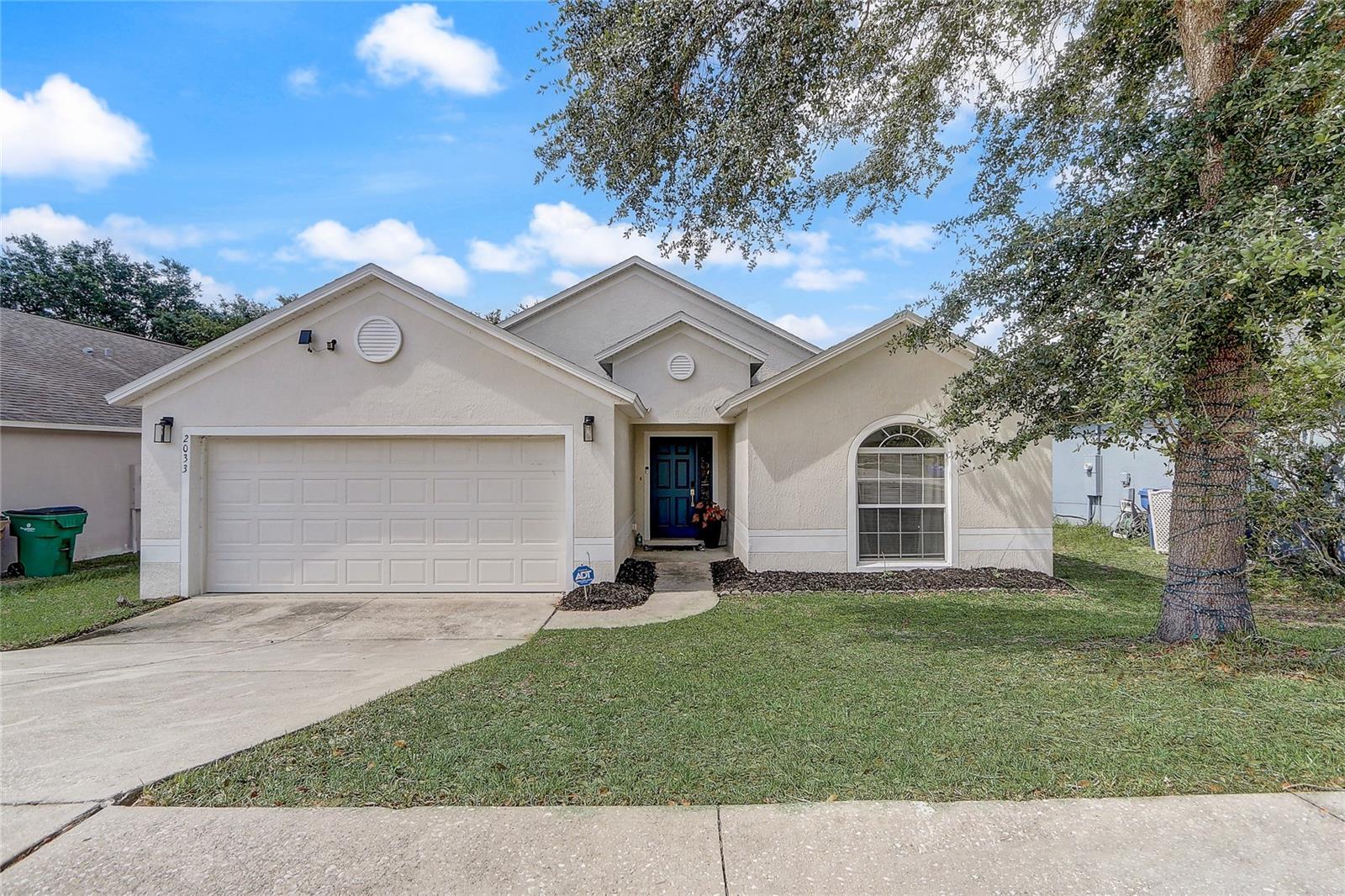 2025 ROOF! Come explore this 4 bedroom, 2 bathroom property in Groveland's Lexington Village community. The bedrooms are organized in a triple split plan arrangement with spacious gathering areas in between. This home has an updated eat-in kitchen, large pantry, interior laundry room, and a backyard patio with shade trees. Improvements by seller include 2025 ROOF; 2024 Quartz kitchen countertops, exterior paint & new garage door; 2021 Smart water heater, range, microwave, refrigerator, dishwasher & living room ceiling fan. The A/C is 2019. Lexington Village HOA offers a community park with grills, picnic area & playground equipment and it's just 3 houses away! For more nearby recreation, Arnold Brothers Park and Public Boat Ramp is approximately 1 mile away and offers a picnic pavilion & fishing boardwalk along the Palatlakaha River, along with small watercraft launch for Clermont Chain of Lakes & Palatlakaha Run Blueway Paddling Trail. Rural meets suburban in Groveland, Florida!