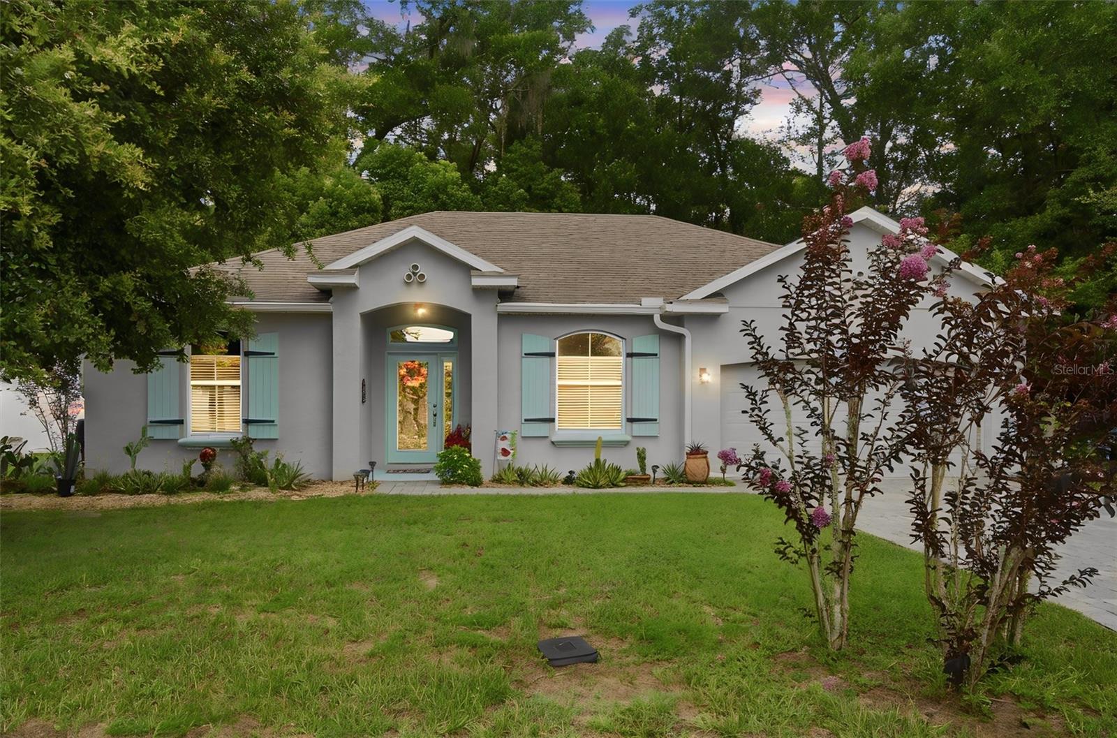 Welcome to this beautifully maintained 3-bedroom, 2-bath home featuring an open, bright split floor plan with volume ceilings and tile flooring throughout. The spacious kitchen is appointed with quartz countertops and offers an inviting layout that's perfect for everyday living and entertaining. Additional updates include a new A/C installed in 2023 for added peace of mind. Step outside to your private, vinyl-fenced backyard, beautifully landscaped with a butterfly garden, storage shed, and convenient outdoor shower—creating the perfect space to relax and enjoy Florida living. Tucked away at the end of a quiet cul-de-sac, this home is ideally located just minutes from Stetson University and historic downtown DeLand, where you'll enjoy shopping, dining, and local events. With easy access to I-4, Orlando and Florida's beautiful beaches are just a short drive away. Meticulously maintained and truly move-in ready! Call for more details or to schedule your private showing!