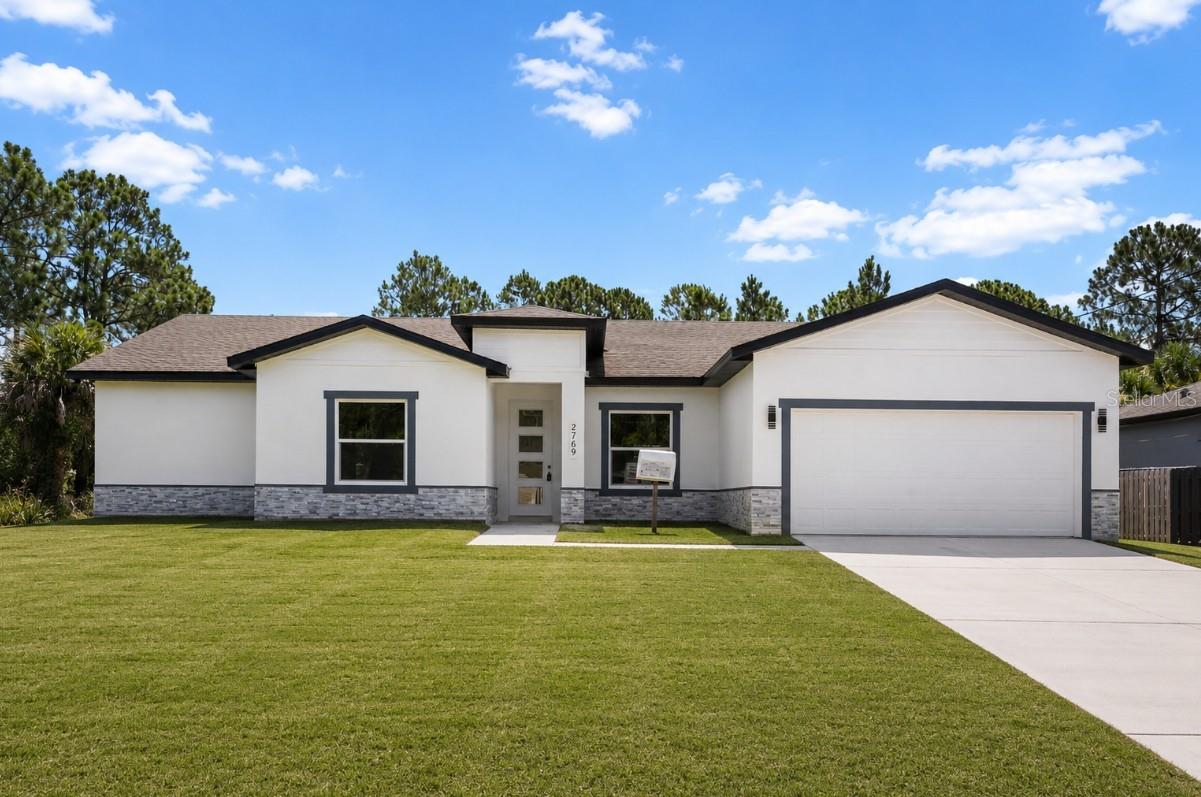 Virtually Staged. Brand-new construction, ready for its first owners! This beautifully designed 4-bedroom, 3-bathroom home offers a smart, well-distributed floor plan with space for everyone — including a private in-law room with its own bathroom, perfect for extended family, guests, or a home office. Every inch of this home is fresh and never lived in, from the modern kitchen to the stylish finishes throughout. Enjoy the peace of mind that comes with all-new construction: new roof, new A/C, new appliances, new everything. Situated on a spacious quarter-acre lot with no HOA and no flood insurance required, in one of southwest Palm Bay's fastest-growing pockets — minutes from Bayside Lakes shopping and dining, with quick access to I-95 via the St. Johns Heritage Parkway, and about 30 minutes to the beaches. Quiet, established neighborhood surrounded by newer homes. Don't miss the chance to be the very first to call this house home — schedule your showing today!