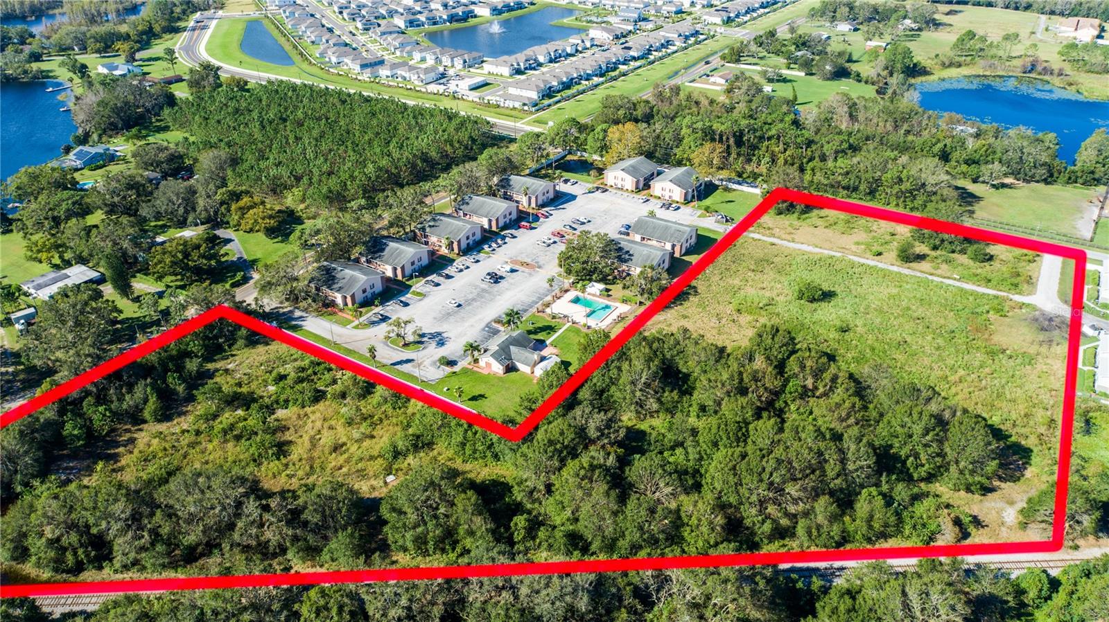 Pre-Construction. To be built. Permitted and ready.  Welcome to this prime vacant land parcel ready for infill on this 6.7 acre lot, with ZONING: MFR2 (18 units each acre); FLOOD ZONE X. Surrounded by development, what could be stylish and beautifully modern 69-unit Condominium on Drexel Rd.  This proposed 2 story Multi-Family product will be built around luscious greenspaces. Just minutes from restaurants, retail and schools.  Conveniently located in the heart of Land O' Lakes, near the intersection of Lake Patience Rd. and Land O' Lakes Blvd (U.S. Hwy. 41).