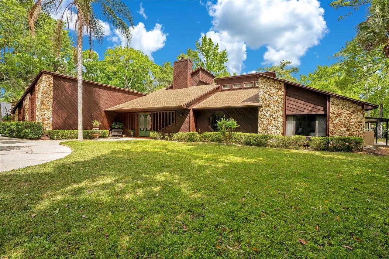 Mid-Century Modern Paradise!!  A Beautiful, well-designed home with spectacular architecture offering privacy, space, and long-term versatility on a rare 2.22-acre lot with RV/Toy parking—delivering exceptional value in this area. A separate in-law or guest suite features its own exterior entrance and full bathroom, ideal for multigenerational living, a private office, studio, or extended stays.

The main living areas are sprawling, thoughtfully arranged with strong natural light and a functional flow for everyday living and a large Loft for entertaining, office or hobbies. The large primary suite includes a spacious en-suite bath and walk-in closet. Bedrooms two and three are oversized, each with walk-in closets; one includes a hidden play loft/ adventure nook accessible through the Narnia style closet access.

The expansive property also includes a detached casita in the backyard, currently used as a workshop, with clear potential to be converted into a guest home, rental unit, or art studio.

Located on a quiet street in an established Winter Springs neighborhood, with convenient access to top-rated schools, shopping, dining, and major commuter routes.

Concessions considered with the right scenario. 

Buyer and buyer’s agent to verify all information. Both owners are licensed real estate agents.