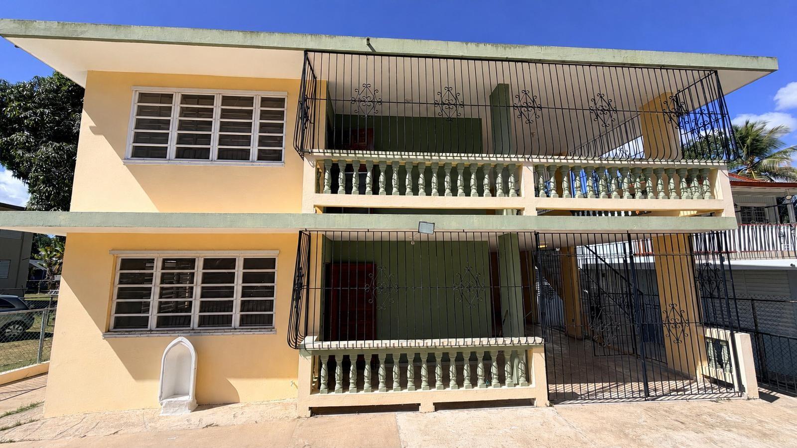 Tucked into the Llanos Tuna sector of Cabo Rojo, this two-story residence brings together space, function, and genuine room to make it your own, offering roughly 2,574 sq ft of living area across two levels where you’ll find three generous bedrooms, a living room, hallway, kitchen, and a practical two-bath layout, one interior and one exterior, all designed for families who value both breathing room and everyday comfort.

Stepping outside, the balcony and porch extend your living space well beyond the walls and become the ideal spot to enjoy Cabo Rojo’s easy climate with morning coffee or to welcome guests at sunset, while the 26x10 ft garage adds the kind of covered parking and storage that’s genuinely hard to come by in this area.

In the spirit of a transparent transaction, we want you to know exactly what to expect, so we’ll say it plainly: the home is delivered solid and well-cared-for, and the repairs to be made are these three, the replacement of the doors, the renovation of the bathroom tile, and a repair to the septic well wall, which means we’re talking about nothing structural or urgent but rather concrete, approachable improvements that let you put your personal stamp on the home while building equity from day one.

And because location is everything, Llanos Tuna places you just minutes from the beaches, restaurants, and laid-back rhythm that make Cabo Rojo one of western Puerto Rico’s most sought-after destinations, turning this property into a real, honest opportunity with room to grow for the buyer ready to write their next chapter.