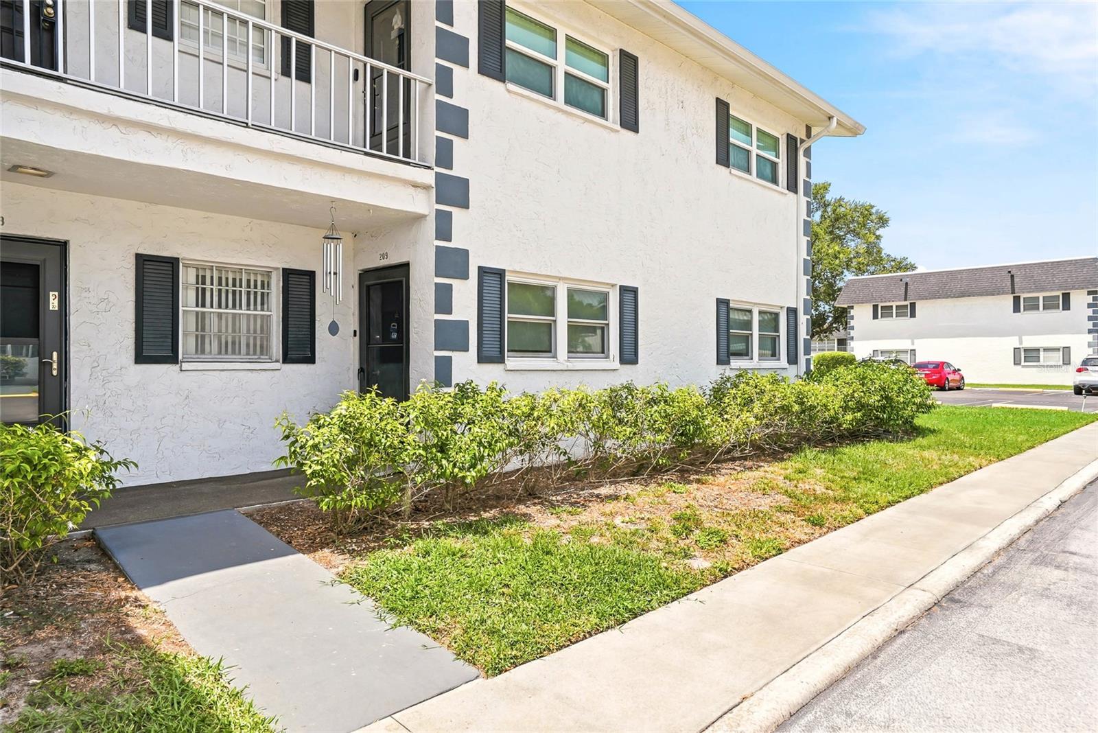 Prepare to be impressed when you enter this beautifully upgraded first-floor corner condo unit in the highly desirable Burgundy One Community of West Bradenton. This fully updated unit offers 1,188 sq ft of heated living space and overlooks a serene courtyard adorned with mature landscaping, just steps away from the community's sparkling pool. Meticulously renovated by the current owner, this condo features a NEW ROOF (2025 maintained by the HOA), HURRICANE DOUBLE IMPACT WINDOWS and SLIDERS (two sliders), a brand-new top-of-the-line stainless steel refrigerator, microwave, dishwasher, and a BRAND NEW HVAC system (April 2026). Additionally, it boasts a BRAND NEW WASHER & DRYER (April 2026-stays for sellers convenience), crown molding, fresh interior paint, a popcorn-free ceiling, and ginormous custom ceiling fans. The custom dining room chandelier adds a touch of elegance, while the ceramic tile flooring throughout ensures a clean, carpet-free environment. Custom remote blinds are installed on every window for convenience. Both bathrooms have been updated with custom finishes, including a walk-in shower. This community is also PET-FRIENDLY! The low monthly fee covers a variety of amenities, including cable TV, internet, water, a central hot water heater, sewer, trash, exterior building and grounds maintenance, management, a heated pool, and more, making everyday living simple and budget-friendly. Seeing is believing—there is NOTHING else like this in the community! It is ideally located about 10 minutes from the breathtaking Gulf beaches of Bradenton, the world-famous shores of Anna Maria Island, and the calm beauty of Coquina Beach and Longboat Key. You’re only 15 minutes from the stunning Gulf beaches, 10 minutes from downtown Bradenton and the Riverwalk area, and just 7 miles from Sarasota/Bradenton International Airport (SRQ) —where convenience meets relaxation in this perfect Florida retreat!  Some pictures have been virtually staged.