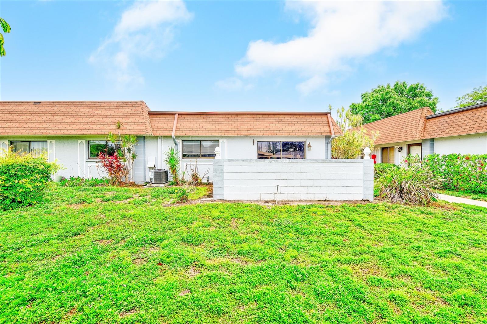 ALL AGES WELCOME in this beautifully-maintained condo unit located in the heart of Pinellas Park!  Featuring 2 spacious bedrooms with large closets, 2 FULL bathrooms, INDOOR laundry, and a back patio that is perfect for entertaining, this END UNIT condo is sure to check all of your boxes at an amazing price.  With a newer AC, private carport parking space, and absolutely NO carpet inside, this open, airy unit is a blank canvas ready for YOUR personal touches!  Cable TV, water/sewer/trash, & community pool are all included in the HOA dues! Prime location close to countless restaurants, shops, businesses, nightlife, gyms, airports, and our award-winning beaches- you won't want to miss this opportunity!  Call today for your private showing.