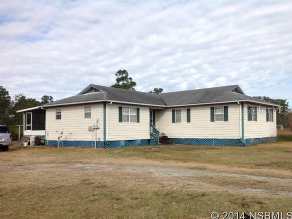 Nice 6 acre farm first time on the market. Kitchen has oak cabinets and laminate flooring in living areas. Large master bedroom with a walk in closet. A/C replaced in 2012, pump and well were replaced in 2009. Back porch is the length of the house. Gutters on the front of the house.  Two stall barn with feed/storage room. Barn has electric and water. Both pastures have water to them. Survey and elevation cert available. Measurements aprox.