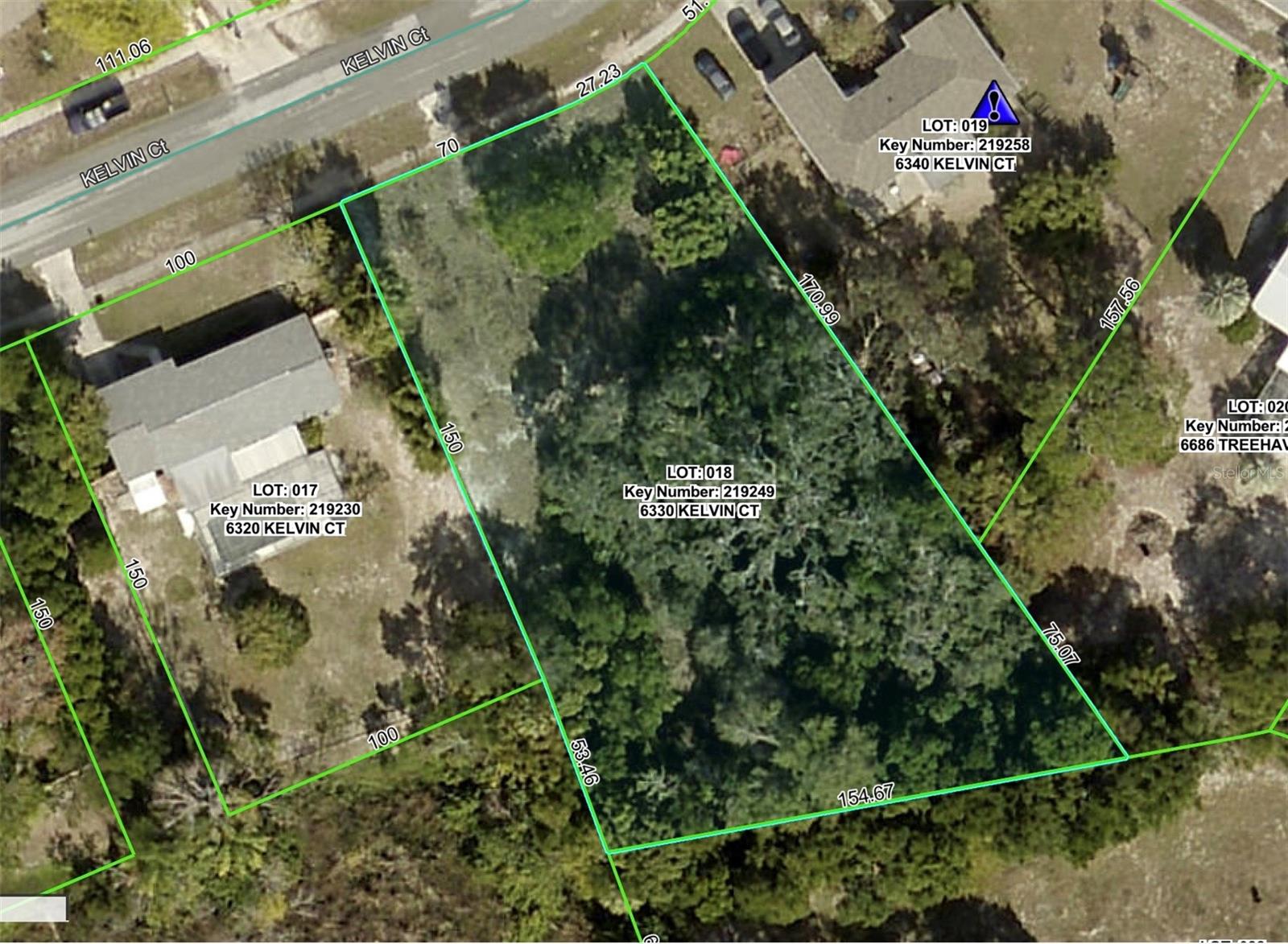 Discover the potential of 6330 Kelvin Court—a spacious parcel larger than most in the area, offering extra room for your ideal home or investment build. The previous home was demolished in 2016, impact fees have been paid per Hernando County - please confirm yourself. Just 0.30 miles from Pioneer Park, this lot provides easy access to outdoor recreation. The rear portion of the lot touches Hunter's Lake and adds a peaceful natural setting. Located in a quiet residential neighborhood with quick access to shopping, dining, and local amenities, this property offers both convenience and flexibility for a variety of plans.