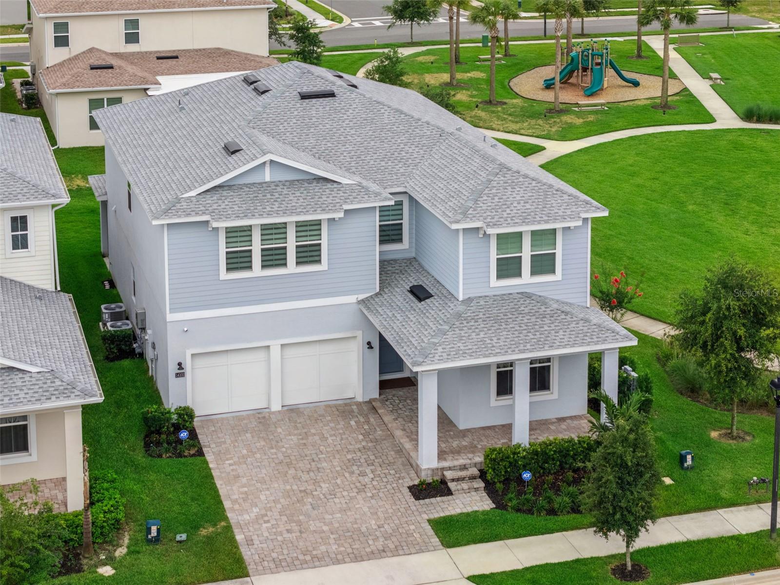This beautifully maintained Toll Brothers Delray floor plan is 2 years new and sits on one of the community’s most desirable lots, directly overlooking the scenic community park. With excellent curb appeal, a covered front porch, and a long brick paver driveway, the home welcomes you from the moment you arrive.
Step inside the dramatic two-story foyer and discover an open, light-filled floor plan with thoughtfully chosen upgrades, neutral colors, and high-end finishes throughout. The heart of the home is the expansive kitchen featuring a large prep island, built-in ovens, vented cooktop, walk-in pantry, and abundant cabinetry for all your storage needs. A convenient downstairs bedroom with a full bath offers ideal space for guests or multigenerational living.
Upstairs, a spacious bonus room provides flexible living options, while the impressive primary suite steals the show with two walk-in closets, a luxurious garden bath, oversized shower, and dual vanities. Every bedroom is generously sized, giving family members their own private retreats.
Just around the corner, the brand-new community clubhouse with its modern contemporary design is scheduled to open in July, bringing a state-of-the-art fitness center and sparkling community pool within easy walking distance.
Perfectly located just minutes from Disney, major highways, top-rated shopping, and dining, this home is also zoned for highly sought-after K-12 schools. Why wait to build when you can move into this like-new Delray now and settle in before the new school year begins? A rare opportunity to own an upgraded Toll Brothers home in an unbeatable location.