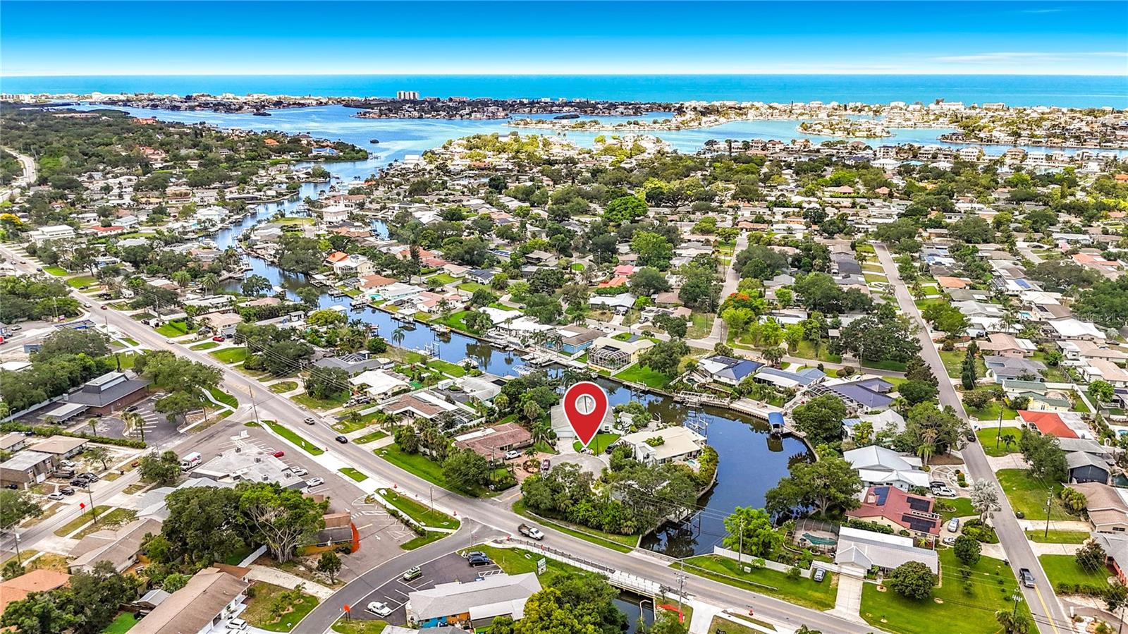 Waterfront VALUE-ADD, great Investor opportunity- featuring approximately 90 feet of saltwater canal frontage with direct access to the Intracoastal Waterway. Located in a highly desirable Largo boating community where neighboring waterfront properties have commanded substantially higher values, this property presents an exceptional opportunity to renovate, rebuild, or create a custom waterfront residence.Existing improvements include a 3-bedroom, 2-bathroom, 2-car garage home, private composite dock, and boat lift. The residence sustained significant roof damage during Hurricane Helene in 2024 and remains unrepaired. Seller is not aware of flooding; however, water intrusion is probable due to the roof damage and prolonged exposure to the elements. Buyers should anticipate deferred maintenance, potential mold, and other environmental or structural concerns. Property is being sold strictly AS-IS, WHERE-IS, with all faults.This may be an ideal opportunity for a complete renovation or redevelopment, offering the chance to acquire a premier waterfront homesite at land-value pricing. The dock appears to be in good condition and includes an approximate 10,000-pound boat lift; however, buyers should independently verify all measurements, specifications, permits, and condition.Due to safety and liability concerns, no interior showings will be permitted prior to offer submission. Interior photographs are available and will be provided upon request. Following a minimum seven (7) day market exposure period, a single inspection and due diligence event will be scheduled for all parties who have submitted offers. The property will be opened for interior access on that date only. No utilities are active, and water, power, or other services will not be provided by the seller.Bring your contractor, architect, and vision—opportunities to acquire nearly 90 feet of waterfront frontage with direct boating access to the Intracoastal Waterway are becoming increasingly difficult to find.  Aerial Video tour link in MLS