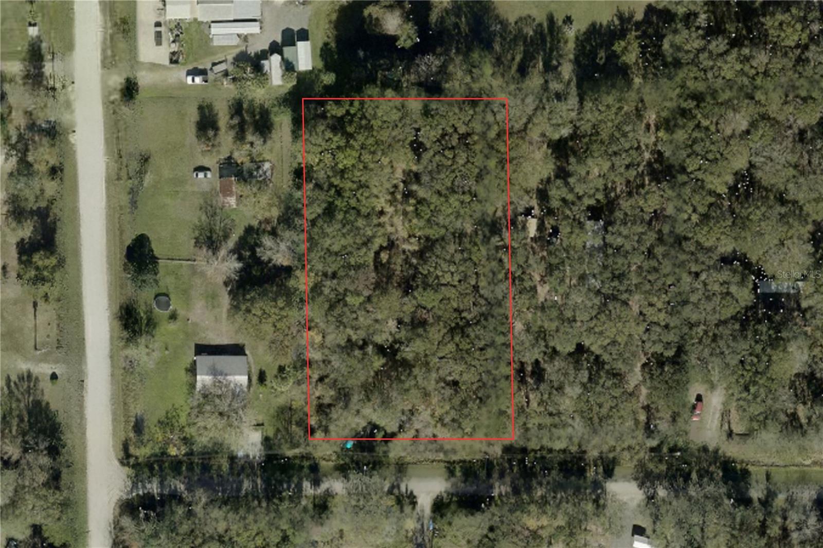Prime location for this 165 x 300', zoned for a manufactured or site-built home where RVs, work trucks, and storage sheds are allowed once the home is on the property. This nice 1.14-acre lot is not in a flood zone, above average in size and is located close to a paved road. Farm animals are welcome, all while being a short drive to shopping, the beach, I-95, hospitals, and the lake. Escape to the peace and quiet of country living with this beautiful vacant land and with no HOA, it is ready for your vision, whether it's a dream home, weekend retreat, or investment, with all improvements being the buyer's responsibility.