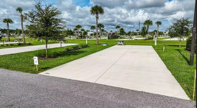New deeded RV lots in Central FL! Welcome to Resort at Canopy Oaks, a brand new, modern, upscale RV resort in Central Florida! Canopy Oaks sits on 435 acres filled with everything that you will need for your perfect RV experience. Enjoy first-class amenities such as Resort style pool, hot tub, large tiki bar w/full bar and sound system, live entertainment, tournament-style pickle ball courts, a spacious clubhouse, onsite cafe/deli and general store, fishing pond, on-site professionally managed activities, access to ILE golf course, large RV and Tiny Home/Cottage sites, pet and guest walking areas and free Wi-Fi throughout the resort! There is a professional onsite management company to manage your lot rentals if you would like to rent your lot out when not in use! (Mgmt Fee 30 / Owner 70). Each site comes with a concrete pad and is able to be upgraded to your liking. Add lush landscaping, a tiki hut, pavers, outdoor kitchen and seating areas and more! Make your RV living dreams come true! All sites have 20-30-50 amp service and the monthly fee of $350 (billed quarterly), includes water, sewer, trash, electric, wi-fi and landscape services. Cable tv is provided in common areas. Each owner pays respective property taxes to the county. If you are an RVer and are looking for a home base in Florida, look no further than Resort at Canopy Oaks! Resort and lot information can be seen on links in listing
