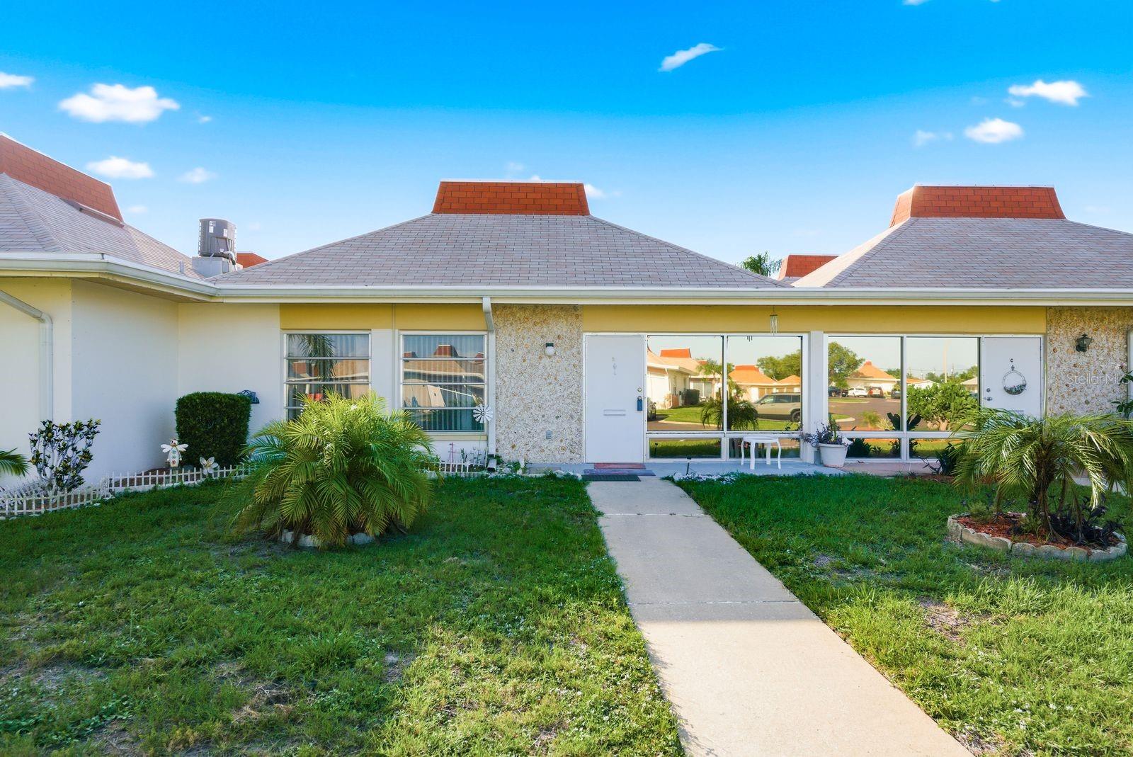 Enjoy affordable Florida living in the beautiful gated 55+ community of Tahitian Gardens! This well-maintained 2-bedroom, 1.5-bath condo offers comfortable, low-maintenance living with laminate wood flooring throughout, spacious bedrooms, large closets, and the convenience of in-unit laundry. Natural light fills the living spaces, creating a bright and inviting atmosphere. 

Tahitian Gardens is centered around a scenic lake and offers an abundance of amenities, including a heated swimming pool, clubhouse, shuffleboard courts, walking paths, and a full calendar of social activities such as bingo, arts and crafts, card groups, dances, and community events. Conveniently located near shopping, dining, beaches, and medical facilities, this is the perfect place to enjoy a relaxed Florida lifestyle.