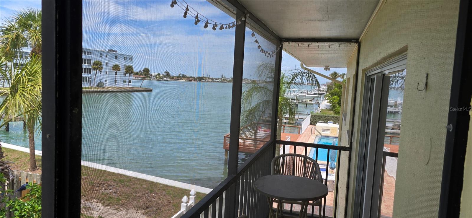 Coastal Serenity Meets Turn-Key Convenience in St. Pete Beach!

Welcome to Unit 204, a beautifully updated 1-bedroom, 1-bathroom second-floor residence nestled in a pristine waterfront community. Fully furnished and completely turn-key, this home offers breathtaking Intracoastal views and an effortless 5-to-10-minute stroll to the pristine Gulf beaches. For ultimate peace of mind, this property was entirely untouched by the 2024 storms.

Inside, a bright, open-concept layout seamlessly connects the kitchen, dining, and living spaces—perfect for daily relaxation or effortless entertaining. The primary suite boasts a generous walk-in closet, while a rare, highly convenient private storage closet sits right outside your front door.

Embrace the resort-style amenities, featuring a scenic waterfront pool overlooking the Intracoastal and two oversized sun decks perfect for gathering with neighbors. Unwind in a quiet, tranquil setting that feels worlds away, while still being just minutes from St. Pete Beach’s vibrant dining, nightlife, and local attractions.

Bonus Value: The HOA has recently completed extensive capital improvements—including full sewer line replacements, a new community water heater, and updated fencing—with the assessment already paid in full. Fresh new landscaping is also slated for completion next month! Includes one reserved parking space plus ample guest parking. Your slice of beachside paradise is ready—schedule your tour today!