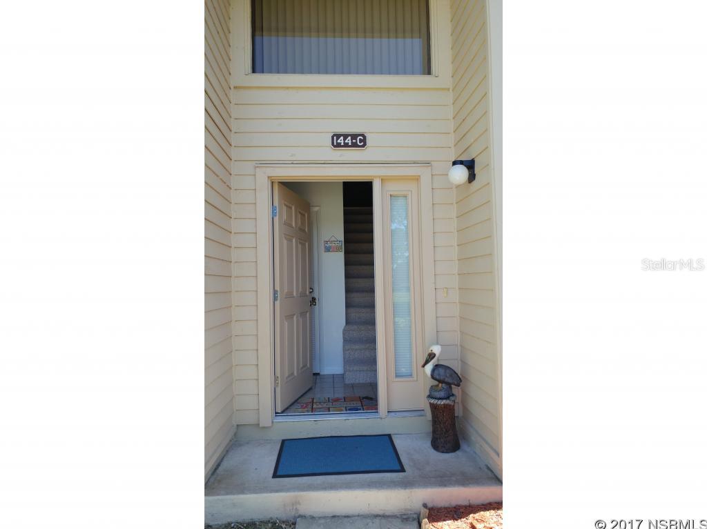 In Prestigious Pelican Bay- Turn key condo -Everything is included, w/newer furniture. It is light & bright with cathedral ceilings in the Large living room. The master bedroom is huge w/a walk-in closet. Beautiful panoramic views from the Balcony- some water views. Don't want to cook- just walk across the street to Restaurant & Bar, or relax & play golf. What I like about this unit is new Berber carpet on staircase & Lanai small appliances included, TV, & new washer & dryer-used once. PLUS A/C newly installed in 2014 & Combo Thermostat/Humidistat for lower electric bill. Close to Shopping-the Tanger Outlets, Volusia Mall & Port Orange Pavillon, schools - Embry Riddle & Daytona State college, & just minutes to the airport & the Worlds most famous beach. HOA fee $705 Annually. ;LocationDescription: Condo ;Water: City