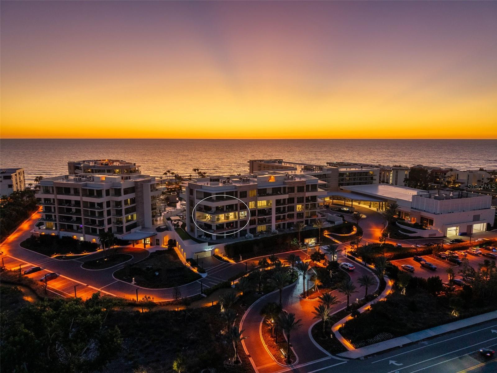 Spectacular Sarasota Bay and city skyline views set the stage for this exquisite and private two-bedroom, two-bath residence at the prestigious St. Regis Longboat Key. Offered fully furnished and thoughtfully designed by Studio G Interiors, the home showcases an elegant coastal aesthetic throughout. A large wraparound terrace with a private gas grill provides the perfect setting for indoor-outdoor living and  entertaining. The spacious owner’s suite enjoys breathtaking Sarasota Bay views and features a spa-like bathroom appointed with Poggenpohl cabinetry and quartz countertops. The en suite guest bedroom offers privacy and comfort with custom-designed closets, making it ideal for visitors or extended stays. Additional highlights include electronic blinds throughout, a built-in office area, and a sophisticated wet bar with designer tile, custom shelving, a wine refrigerator, and an ice maker—perfect for entertaining. The gourmet kitchen is beautifully appointed with Poggenpohl cabinetry, a Sub-Zero refrigerator, Wolf double ovens and six-burner cooktop, and a Cove dishwasher. A dedicated laundry room with sink is equipped with an Electrolux washer and dryer. Completing this exceptional residence is a private two-car garage, offering rare convenience and security.  Beyond the residence, The St. Regis Longboat Key Resort offers a curated collection of world-class amenities designed exclusively for residents. The private clubhouse includes a state-of-the-art fitness center, a resident-only pool and spa, and access to the signature St. Regis Butler and Concierge services that redefine luxury living. Indulge in the oceanfront spa, diverse dining venues, and beachfront cabanas, or enjoy family-friendly experiences such as a lazy river and saltwater lagoon teeming with tropical fish, stingrays, and resident tortoises. Set on 17 acres of pristine beachfront, and just 3.5 miles from St. Armands Circle’s renowned shopping and dining, this residence represents more than a home—it’s an invitation to embrace the legendary St. Regis lifestyle, where elegance, comfort, and unparalleled service define every moment. Begin your journey to Live Exquisite at The St. Regis Longboat Key.