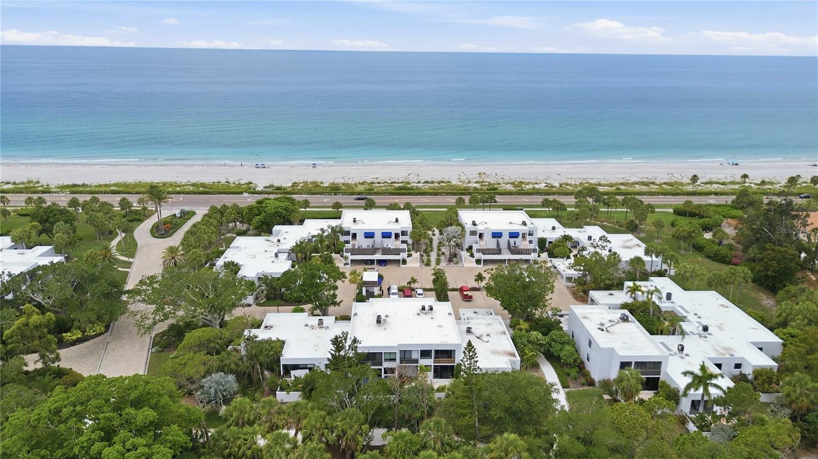 Discover the essence of coastal resort living at Bayport Beach & Tennis Club on Longboat Key, a beautifully landscaped 27-acre Gulf-to-Bay community where every day feels like a vacation and the timeless charm of island living unfolds amid tropical beauty and world-class amenities. Surrounded by mature vegetation and scenic walking trails, this exceptional property offers 1,200 feet of private deeded Gulf of Mexico beach access just across the street and Sarasota Bay at your doorstep, complete with a fishing pier and kayak launch for enjoying Florida's spectacular waterfront lifestyle.

This residence offers comfortable, maintenance-free living with an open floor plan, a tastefully updated kitchen, inviting indoor-outdoor living spaces, a private lanai, impact-resistant windows and doors, private covered parking, a private mailbox, and a private storage room ideal for bicycles and beach gear. Whether enjoying morning coffee on the lanai, taking an evening stroll along the beach, or watching Longboat Key's world-renowned sunsets paint the sky steps from your door, every day feels like a retreat.

Residents enjoy an impressive collection of resort-style amenities, including a heated Junior Olympic lap pool, four Har-Tru tennis courts, a fitness center, clubhouse and community room, bayside fishing pier, kayak launch and storage areas, and an active, welcoming social atmosphere. On-site management and meticulously maintained grounds further enhance the carefree island lifestyle.

Ideally located on infamous Longboat Key, Bayport offers the perfect balance of tranquility and convenience, just moments from Publix, Ace Hardware, pickle ball facilities, waterfront dining, exceptional shopping, boating, golf, St. Armands Circle, the Ringling Museum, dog parks, and the cultural attractions of downtown Sarasota. More than simply a condominium, Bayport is an opportunity to embrace one of Florida's most desirable island lifestyles, and this residence represents an exceptional value and one of the most attractively priced opportunities within this highly sought-after community.

Come experience why so many residents say that living at Bayport isn't just owning a home—it's embracing a year-round island resort lifestyle that others only experience on vacation.