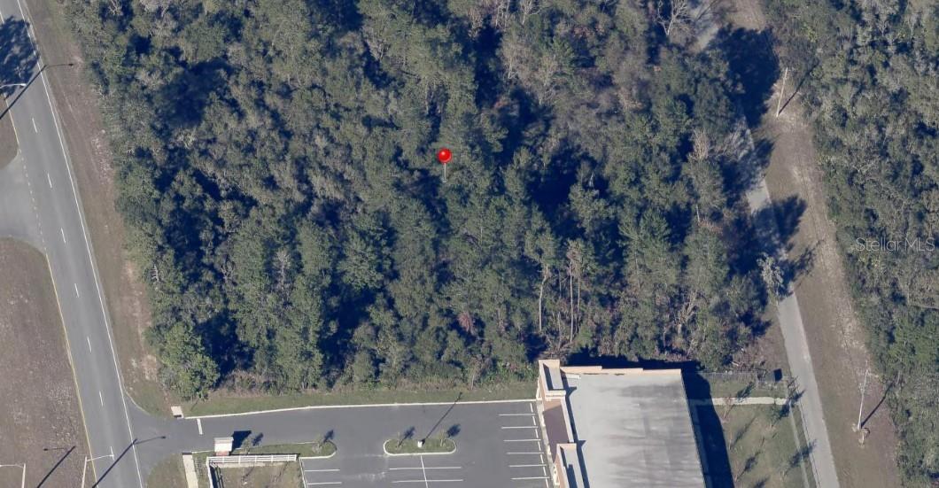 Excellent opportunity to establish your business in the rapidly growing Marion Oaks community.  This .69 acre B-2 zoned commercial parcel offers outstanding visibility along Marion Oaks Blvd, one of the area's primary thoroughfares, with steady daily traffic.  Located adjacent to an existing commercial development and surrounded by ongoing residential growth, this property is ideally positioned for retail, professional office, medical, restaurant, service oriented businesses, or future investment.  Utilities are nearby, paved road frontage and the site is outside of a flood zone.  Take advantage of the continued expansion throughout Marion Oaks and Marion County, where population and commercial growth continue to drive demand for new businesses and services.  A rare opportunity to secure a highly visible commercial location in one of Southwest Ocala's fastest growing communities.