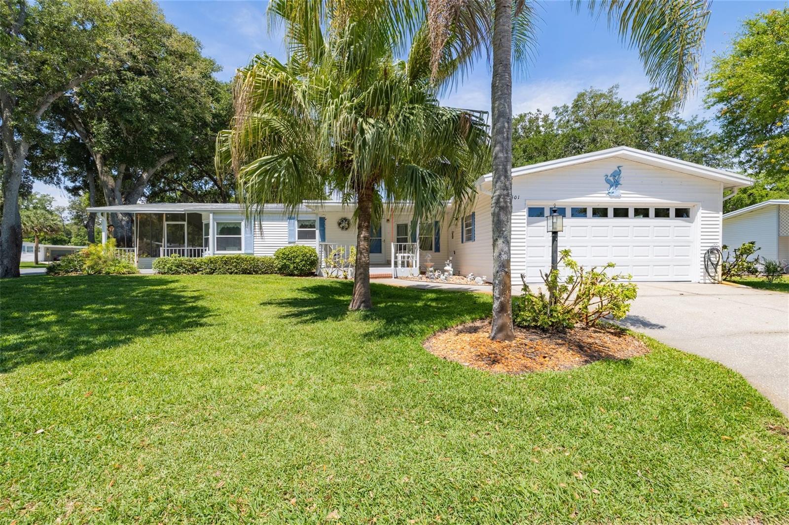 RARE FIND!  3 BEDROOM, 2 CAR GARAGE, LARGE SCREEN PORCH WITH SEPARATE PATIO FOR YOUR BBQ GRILL.  IMMACULATE ALL FURNISHED HOME ON CORNER Lot (don't need furniture it will be donated).  Eat-in kitchen with bay window.  Luxury plank floor throughout and a few areas tile.  NO CARPET! HOA includes cable, internet, one outside storage for either a boat or RV when available.  Resident only boat ramp into the intracoastal, amenities galore -  few are pickleball, tennis, card games, new clubhouse being constructed (no finish date yet).  

R00f 8/22,A/C 11/24 smart thermostat. 3 ton, hot water heater 2013, wall oven 3/2011

Above all - priced right and move in ready!