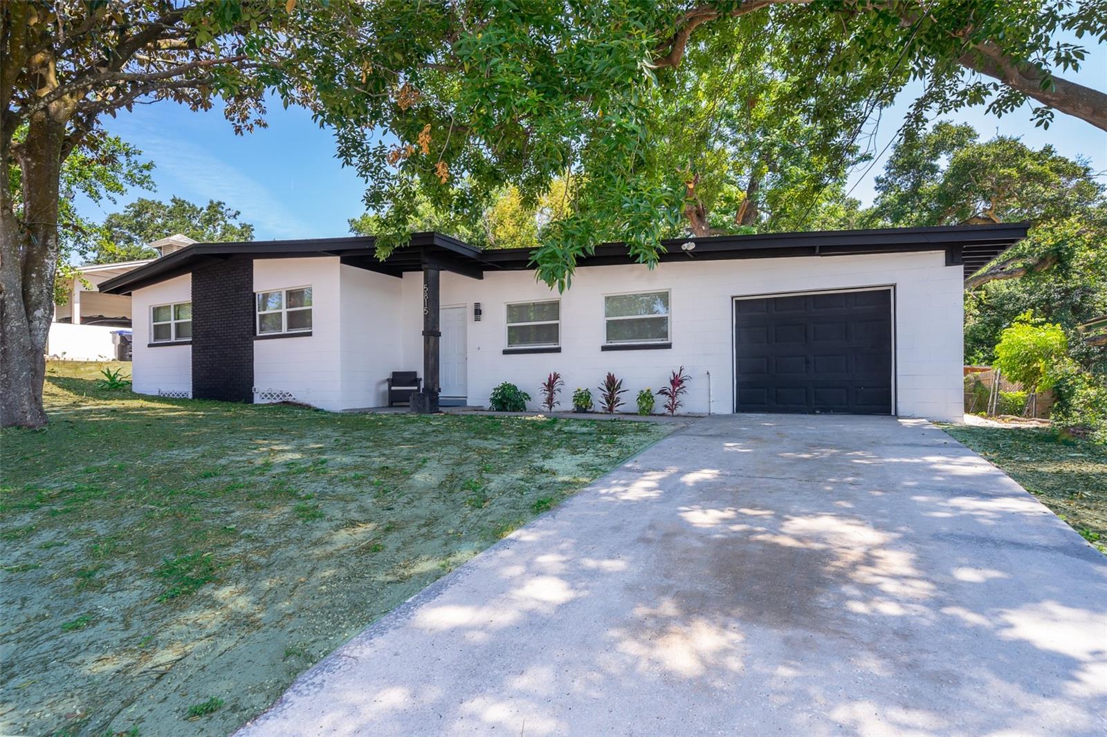 ATTENTION HOME BUYERS!! THIS IS THE GREATEST OPORTUNITY TO BUY YOUR UPDATED DREAM 3 BED 2 BATH SINGLE FAMILY HOME BLOCK IN A ELEVATED LOT WITH A BONUS ROOM. NO HOA NEITHER CDD. NEW ROOF, A/C, NEW WINDOWS, NEW ELECTRIC TANKLESS WATER HEATER, NEW PAINTING, UPDATED ELECTRIC PANEL, RENOVATED BATHS. ONCE YOU ENTER TO THE HOUSE, YOU WILL FEEL LIKE YOU ARE AT HOME. IT HAS AN AMAZING DISTRIBUTION CAUSE THE BEDS ARE IN LEFT SIDE OFFERING PRIVATE SPACIOUS TO GET REST. THE KITCHEN IS BEAUTIFUL, IT HAS UPDATED GABINETS, WITH A COZY QUARZ COUNTER TOP AND BEAUTIFUL BACKSPLASH, THE APPLIANCES ARE UPDATED. BESIDE THE KITCHEN, YOU WILL SEE THE BONUS ROOM WHICH CAN BE USED AS OFFICE OR MINI GAME ROOM. BEDS AND BATH ARE SUCH COMFORTEBLE DUE ITS SPACES. LARGE BACK YARD PERFECT FOR ENTERTAIMENT. SUPER CONVINIENT LOCATION NEAR TO MOST HIGHWAY, DOWNTOWN ORLANDO, AIRPORT, FUN PLACES TO VISIT, GROCERY STORES AND MUCH MORE!! . CALL NOW!! IT WILL NOT LAST LONG!!