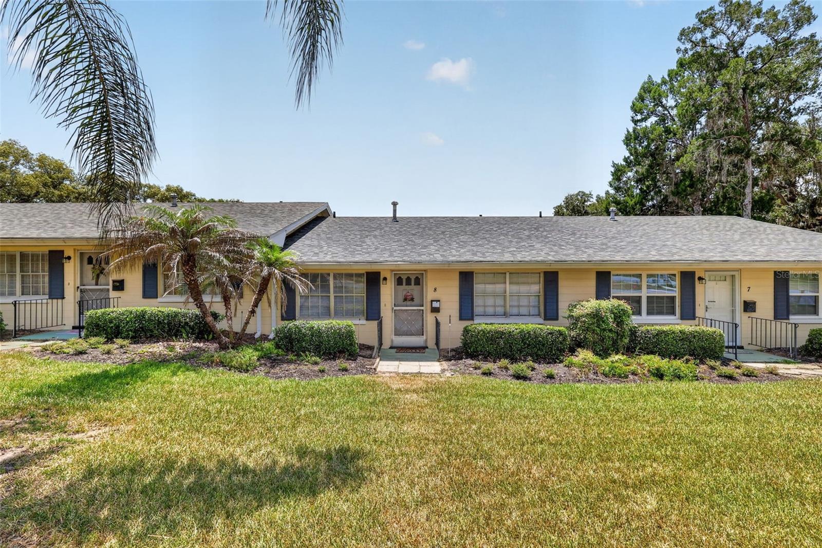 Welcome home to Park South, a peaceful 55+ community conveniently located near Historic Downtown Mount Dora, Gilbert Park, and beautiful Lake Dora. This well-maintained first-floor condominium offers the perfect blend of comfort, convenience, and low-maintenance living.
Offering 1,020 square feet of thoughtfully designed living space, this 2-bedroom, 1.5-bath residence features an inviting floor plan with a spacious living room, generous dining area, and an abundance of natural light throughout. The kitchen offers ample cabinet and counter space and opens to the dining area, creating a comfortable space for everyday living and entertaining.
The oversized primary bedroom provides plenty of room for a king-sized bedroom suite, while the second bedroom is ideal for guests, a home office, or hobby room. An indoor laundry room adds everyday convenience, and the covered rear carport with attached storage offers protected parking and additional storage space.
Enjoy maintenance-free living with exterior maintenance, grounds maintenance, and insurance included in the condominium association. Conveniently located near downtown Mount Dora's unique shops, restaurants, waterfront, parks, and community events, this home offers easy access to everything that makes Mount Dora one of Central Florida's most desirable destinations.
Whether you're searching for a full-time residence or a seasonal Florida retreat, this inviting Park South condominium is ready to welcome you home.