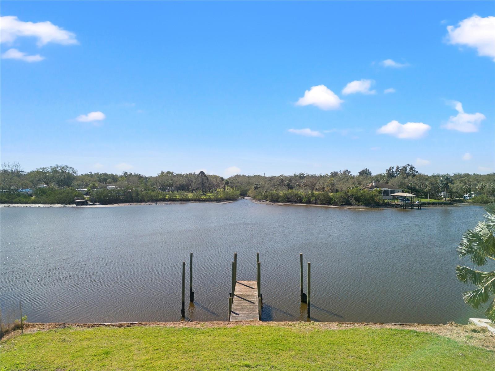 Under contract-accepting backup offers. Build Your Dream Home on this Stunning Alafia Waterfront Lot! This exceptional buildable lot offers a prime opportunity to create your piece of paradise. All renderings are for illustrative purposes to showcase potential home designs that may be built on this lot. Situated on the Alafia River, enjoy breathtaking views and convenient boating access to Tampa Bay.. Enjoy the benefits of a sea wall and a double-sided boat dock that is ready for power and boat lifts, making it ideal for boating enthusiasts. Close to I-75 and the Selmon Expressway, 25-30 minutes from top Tampa destinations: like Downtown/Channelside/Sparkman/Water Street, Tampa International Airport, Hyde Park Village, Armature Works, International Plaza, Midtown, and Raymond James Stadium. Schedule your showing today!