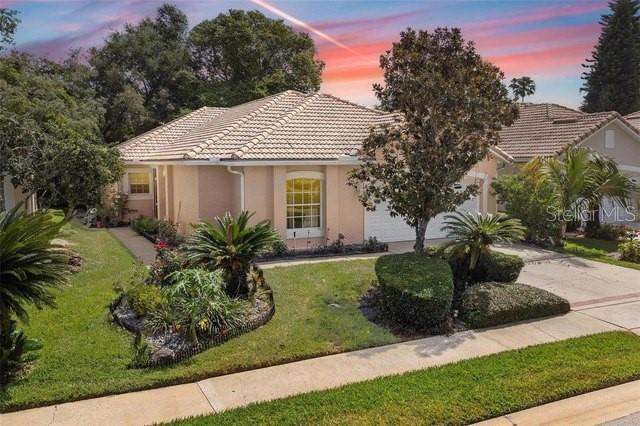 Welcome to 322 Foxhill Circle in Debary, Florida — a well-maintained 3-bedroom, 2-bath home offering comfort, functionality, and thoughtful updates throughout. This home features a desirable split floor plan, providing privacy for the primary suite while keeping guest or secondary bedrooms on the opposite side of the home. The spacious primary bedroom includes two walk-in closets and an en-suite bath complete with a relaxing garden tub. The kitchen was beautifully remodeled in 2020, and all appliances are 2021 or newer, offering modern convenience and peace of mind. Both bathrooms were tastefully updated in 2025, adding a fresh, contemporary feel. Enjoy additional living space with an enclosed bonus room—perfect for a home office, playroom, or flex space to suit your needs. The screened-in front porch creates a welcoming spot to relax, while the outdoor flower garden adds charm and curb appeal. Major systems have been well maintained, including an air conditioning system and hot water heater replaced in 2014. The home is built with solid concrete block construction and features a durable concrete tile roof, offering long-term durability and confidence for homeowners. Located behind an unguarded gated entrance, this property offers an added sense of privacy and security while still being conveniently close to local amenities. Come see all that this inviting home has to show—schedule your private showing today!