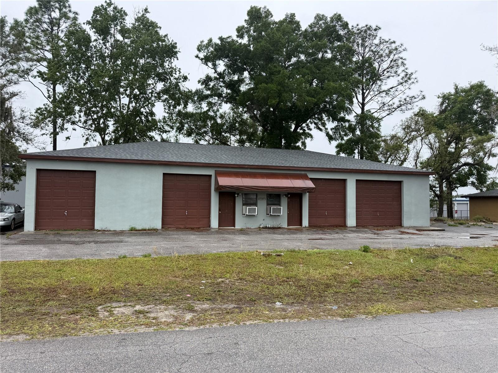 Excellent opportunity to acquire a versatile 3,200 SF commercial building in Southwest Ocala, zoned B-5 (Heavy Business) allowing for a wide range of commercial and light industrial uses. The property is configured with multiple grade-level garage bays, making it ideal for automotive, service, storage, contractor, or flex space users. The interior layout includes a combination of garage/workspace areas along with a small office, restrooms, and support space, providing functionality for both owner-users and investors alike. 

Situated on a convenient corridor with easy access to major thoroughfares, the property offers ample on-site parking, easy ingress/egress, and strong usability for a variety of business operations. The B-5 zoning allows for intensive commercial uses, making this a highly flexible asset with long-term upside potential.

This property can be utilized as a single-user facility or adapted for multi-tenant income, offering both immediate usability and future value-add potential.