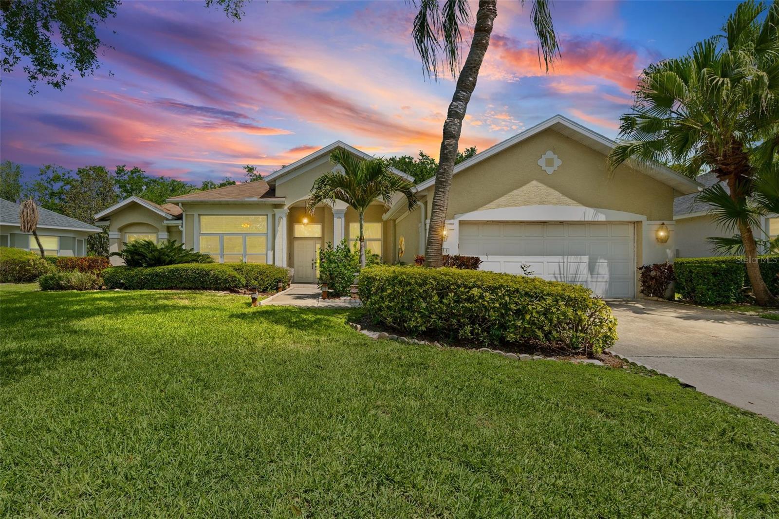 Welcome to the highly sought-after Hawthorn Park community, where oak-lined streets and timeless pride of ownership create a warm, welcoming atmosphere. Just minutes from Robinson Preserve and the world-class beaches of Anna Maria Island, this beautifully maintained 4BR + office/den home sits on an oversized lot with an ideal split plan and a private guest/in-law suite with its own entrance. The true highlight of this property is the oversized custom pool and spa, a stunning outdoor retreat perfect for unforgettable gatherings, peaceful mornings, and relaxing Florida evenings under the expansive screened lanai. Inside, soaring 10ft ceilings, an open kitchen/great room, and a French-door office create an inviting, comfortable flow. Major upgrades include Roof 2017, solar panels, hurricane-impact windows, whole-house generator, central alarm, engineered floors, central vacuum, and water softener. With all the big-ticket improvements already completed, this home offers exceptional value in one of NW Bradenton’s most cherished neighborhoods.