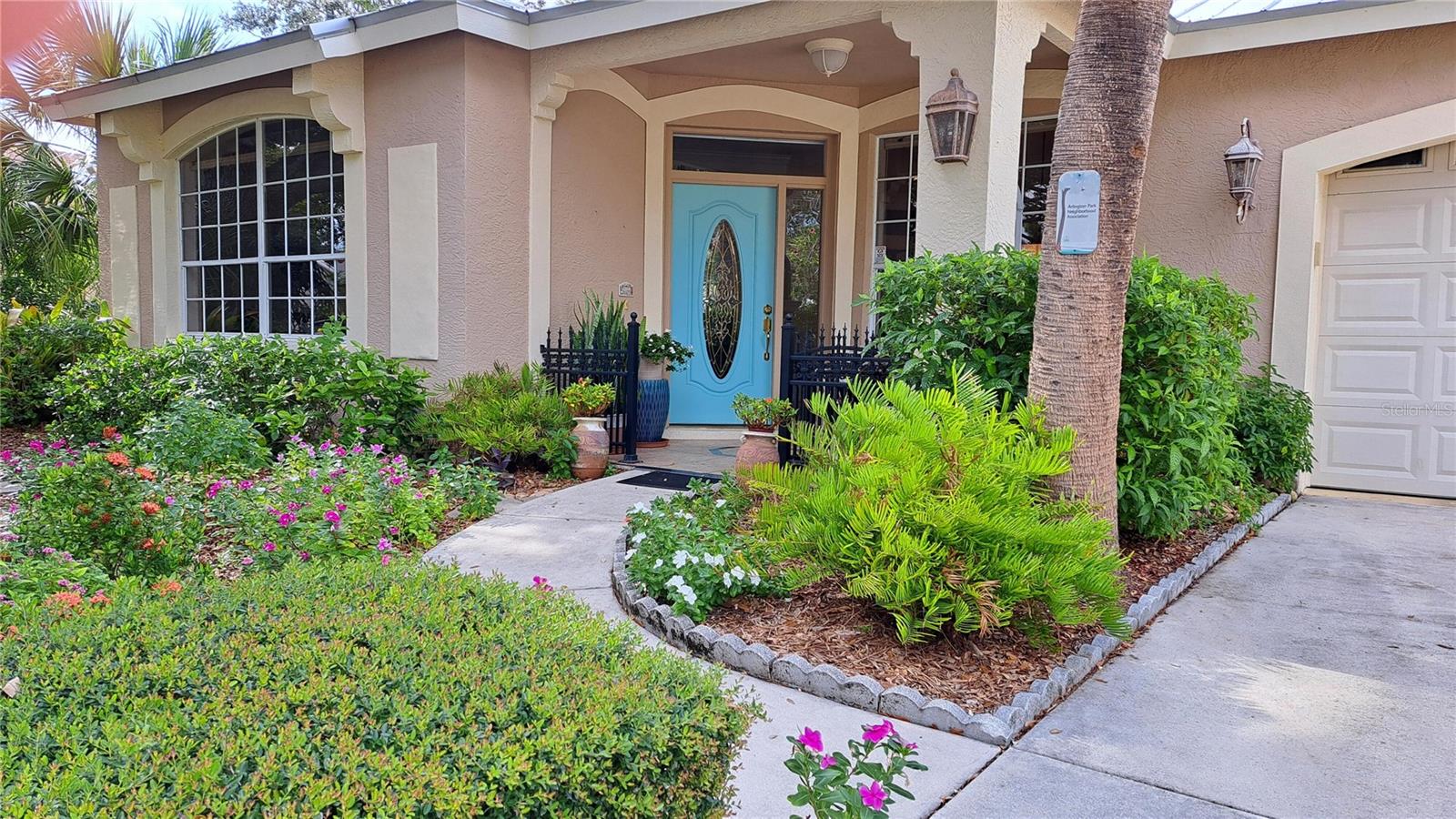 Walk to downtown Sarasota and ride your bike to America's two best beaches; Lido and Siesta, and ride the Bicycle Legacy Trail nearby. This 1992 beautifully designed and built floor plan with near 10' ceilings flows well and even allows for a possible in-law or guest quarters, separate from your private area. Relax on your oversized roofed and screened Lanai and enjoy the Selby-Garden-like-yard full of blooming tropical plants and palm trees. Live anxiety free as this house incurred no leaks, no flooding, and no loss of electricity during past storms. The metal roof and the concrete block construction are rated the most wind resistant of all building materials. The Homeowners Insurance is only $3,100 including hurricane coverage; no flood insurance is required as the zone is X. Not only do you have no association or CDD fees to pay, the Arlington Park neighborhood is one of the most desired areas in the City of Sarasota with the city's prized AQUATIC CENTER and PREMIER PARK, full of amenities, a few blocks away. The highly rated Sarasota Memorial Hospital is 1/2 mile away along with numerous restaurants and pubs within walking distance. Enjoy peace of mind knowing the Arlington Park Neighborhood is a quiet, serene place to live. CLOSE, and BEAUTIFUL makes this a home you MUST-SEE. Located on a cul-de-sac in the only subdivision within the Arlington Park Neighborhood where all the homes were built in 1992 and seldom do any come available. Six of the eight homes have identical floor plans with different facades adding interest to the little subdivision. 3-bedrooms, 2-baths, 2-car garage, 10’-ceilings, 1894 Sq.Ft., with angular walls for added interest, living- room, plus family-room, plus dining-room, gated front-porch and screened & roofed oversized-lanai and lush tropical foliage and a privacy-fence surrounding the entire home on a quiet and city cul-de-sac. The neutral-colored-diagonal tile runs throughout the entire home. -Pet-free house for the last 9 years and no carpet SO YOUR ALLERGIES WON’T ACT UP, plus a central vacuum blows the exhaust from vacuuming into the garage and it is not recirculated inside the house. -Pesticide Free House and Yard for the last 21 years. No Fire Ants here, No grass to mow. Location, Location, (No incidents in my 20 years) -Bicycling Aficionados can ride the nearby Legacy Trail. -Walk to upscale restaurants, and pubs in the Southside Shopping area plus Morton's Gourmet Market. Fast food is even closer. Plus the City’s Premier Recreational Facility, Arlington Park Aquatic Center is ½ mile away, with several Pools, a ½ mile Shaded Walking Trail, a Dog Park, Play Ground, Tranquil Lake, Picnic Tables, Tennis & Racquet Ball Courts, and indoor, air-conditioned Pickleball. -Less than ¾ mile is a YMCA with an Olympic Pool and L.A. Fitness with a Pool. -Walk just two miles to the Regal Cinemas in Downtown and lots of Restaurants and Entertainment. -Walk or ride 1 mile to Cinebistro and Live Theater Performances in the Southgate Mall. -Sarasota Memorial Hospital is less than ½ mile -Grocery Stores are less than a mile away -Walk to High School and Middle School .8 mile away. Top-Rated Southside Elementary.