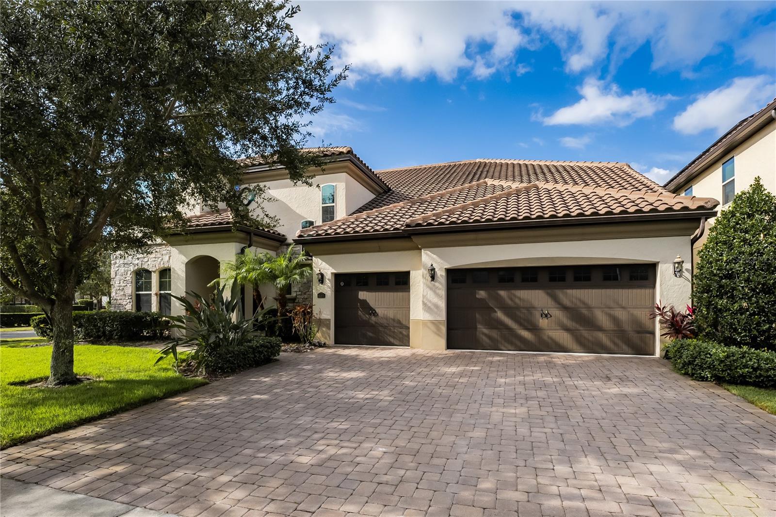 Absolutely stunning and fully FURNISHED, this 6-bedroom home 6.1 baths is a masterpiece of design. With an oversized 3-car garage and professional decor, it's a true gem. Step into elegance as you enter the formal dining room, leading to the spacious family room, nook, and eat-in kitchen with island sink and bar. The first-floor owner's suite offers a private sitting room, spa-like bath, and ample closet space. An additional bedroom and full bathroom grace the first floor. 

Moving upstairs, you'll find another master bedroom, a two-bedroom "jack & Jill" setup, a full bedroom suite, and bedrooms with generous storage. An entertainment lover's dream, there's a loft/lounge with bar, game room, and a professional home theater. Step out to the lanai for relaxation or BBQ parties by the sparkling pool and summer kitchen. 

Nestled in Parkside, close to Apopka Vineland Road and I-4, this home offers top-rated schools, private community amenities, and quick access to O-TOWN WEST, Publix Shopping Centers, Disney Springs, and Interstate-4. Nearby, explore tranquil park trails and the largest chain of freshwater lakes in Florida. The Orlando International Airport is just 20 minutes away.

And for golf enthusiasts, the World Famous Bay Hill Golf Club, home of the Arnold Palmer Invitational, is a mere 2-minute drive. This impeccable home is move-in ready and waiting for you to make it yours!