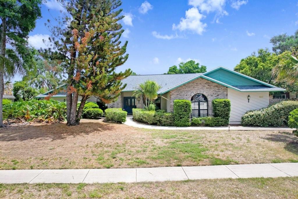 Welcome to Hickory Hill, a beautiful, established community known for its stately homes, oversized lots, and prime location close to major roadways while still offering a peaceful, tucked-away feel.

This MOVE-IN READY pool home offers the perfect blend of updates, space, and charm. Major improvements provide peace of mind, including a NEW ROOF (2025), exterior paint (2024), repiped plumbing (2024), and A/C ductwork replaced (2023). Septic and drainfield were replaced in 2009/2010.

Step through the double front doors into a freshly painted interior (2025) featuring high ceilings, abundant natural light, and updated fans and lighting fixtures throughout. Just off the entry, you’ll find a private office with French doors, ABSOLUTELY perfect for working from home.  The home offers both formal living and dining rooms, complete with pocket sliding doors leading out to the lanai, creating a seamless indoor-outdoor flow. A convenient half bath is located nearby for guests.

The primary suite is privately situated at the front of the home and features high ceilings, direct lanai access, and an ensuite bathroom with a large walk-in closet plus an additional closet for extra storage.  You’ll love the split bedroom floor plan, with two generously sized secondary bedrooms and guest bathroom with newer updates
Step outside onto your freshly painted lanai, complete with a FULL Bathroom with shower.  Salt water pool is regularly maintained and ready for you to jump in.  Your backyard is surrounded by mature, easy-to-maintain landscaping, perfect for relaxing or entertaining year-round.

The kitchen offers ample space and is ready for your personal touch, overlooking the family room and eat-in area, all highlighted by soaring ceilings, a charming fireplace, and custom built-in shelving creating a warm and inviting gathering space.

Homes in Hickory Hill rarely become available and you don’t want to miss your opportunity to own in one of Seffner’s most desirable communities!