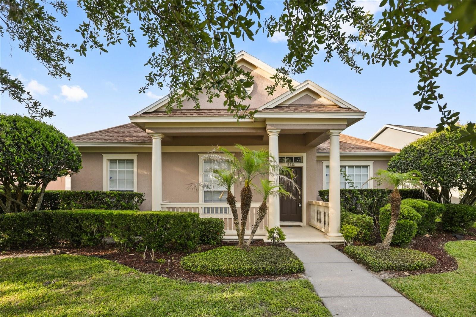 **This house comes with a REDUCED RATE through the seller's preferred lender. This is a lender-paid rate buydown that reduces the buyer's interest rate and monthly payment** Welcome to Lakes of Windermere, where comfort, thoughtful upgrades, and an unbeatable Central Florida location come together in one beautifully maintained home. Inside, you’ll love the inviting layout with formal living and dining spaces accented by custom crown molding, flowing into a kitchen designed for both function and style with marble countertops, stainless steel appliances, and a large pantry—all open to the family room so everyone stays connected. Step outside to the screened patio, the perfect spot for morning coffee, weekend grilling, or winding down in the evenings. The primary suite feels like a private retreat with a tray ceiling, spacious walk-in closet, and an en-suite bath featuring dual vanities, a soaking tub, and a separate walk-in shower, while three additional bedrooms present flexible space for guests, a home office, or growing households. Major updates have already been taken care of, including a new roof (May 2022), HVAC (2021), water heater (2022), plus fresh interior paint, baseboards, and newer ceiling fans, giving you true move-in-ready peace of mind. Enjoy resort-style community amenities like tennis courts, a playground, a community pool, and a pier on Lake Sawyer, all conveniently located near shopping, dining, major highways, theme parks, and everyday essentials.