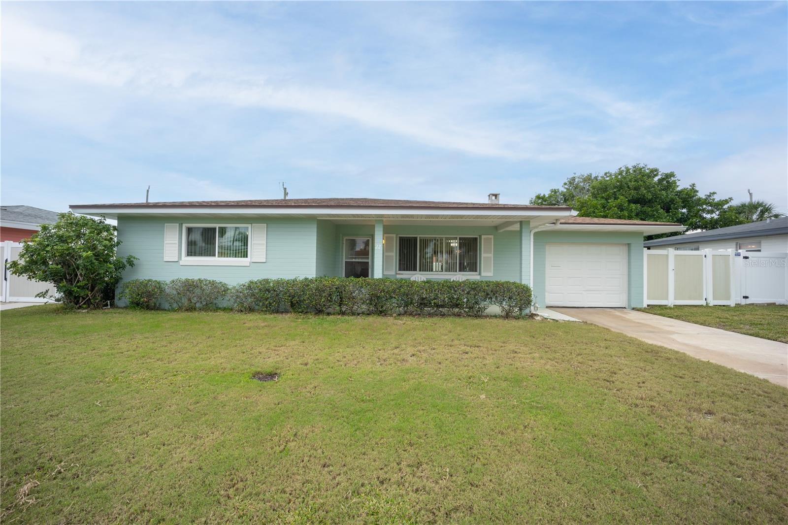 One or more photo(s) has been virtually staged. A hidden gem, just a short stroll from the drive-free beaches of Ormond-By-The-Sea. With new impact windows in the bedrooms 2020, Hurricane Shutters, A/C 2017, Roof 2017, an upgraded electrical panel, New HWH and new appliances, this home is an ideal choice for those who value both convenience and peace of mind. Ceramic tile floors throughout, 2 living areas plus dining area provide ample space. The midcentury modern bathrooms are a unique and stylish touch, adding retro charm. The fenced backyard and shed provide ample storage space and privacy. Enjoy new covered back patio with a summer kitchen, as an ideal spot for outdoor entertaining or simply relaxing in the sun. This property is a fantastic option for anyone seeking a tranquil and stylish living space close to the beach!!

Kindly note all information intended to be accurate and correct, but cannot be guarantied. Some photos have been virtually staged.