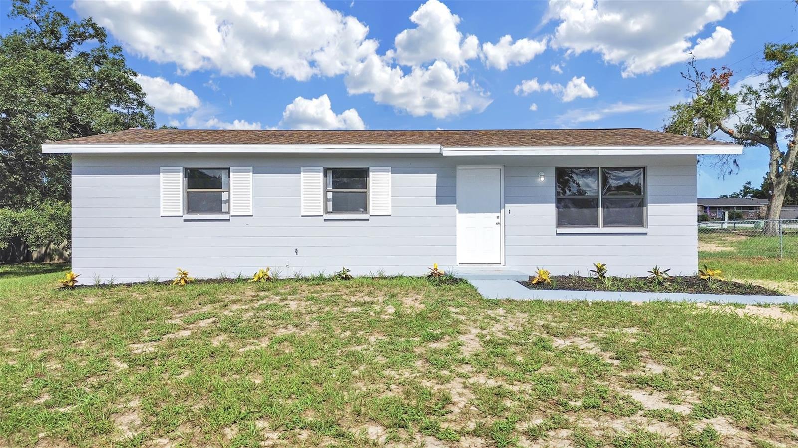 TEAR UP THE “HONEY-DO” LIST!!. This 3-bedroom, 1-bath home sits on a fenced, quarter-acre lot in Spring Hill — with no HOA and no CDD to eat into your budget. TOTAL PEACE OF MIND: The big-ticket items are already handled — NEW HVAC (2026), NEW water heater (2026), and NEW LVP flooring throughout (2026). The interior and exterior have been freshly painted (2026), and the bathroom has been fully remodeled (2026). The kitchen offers real wood cabinetry and brand-new stainless steel appliances. THE LOCATION: Set on a fenced 0.23-acre lot in Spring Hill, this home offers room to spread out. You're about 13 minutes (5.6 miles) from Tampa General Hospital Spring Hill, with easy access to Mariner Blvd and US-19 for everyday shopping and commuting. Enjoy the freedom of NO HOA and NO CDD. Schedule your private tour today — this one won't last!