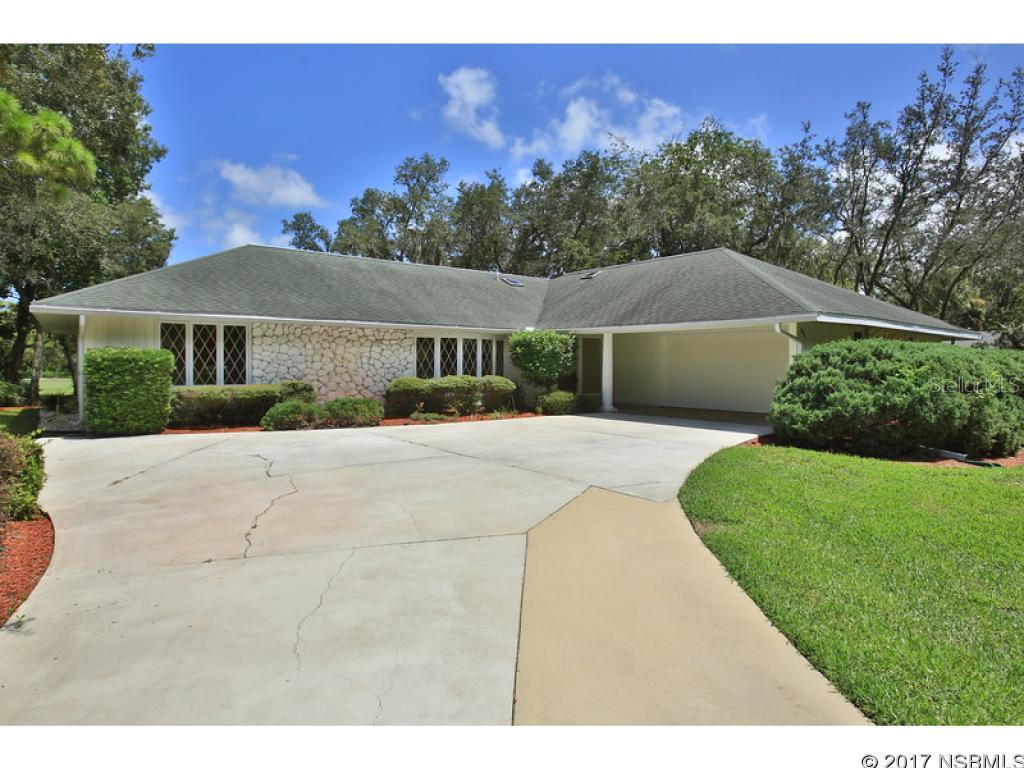Beautifully remodeled Golf Course home.  Peacefully located on the fairway.  Large screened porch with BBQ, new kitchen and baths with granite and vinyl planks.  Lots of windows to let in natural light.  Oversized two car garage..room for golf cart.  Nicely landscaped.  Stone gas fireplace.  Open floor plan.  Dining room area would make excellent music room or office.  Quiet location.  All new appliances.  Almost new HVAC and new hot water heater.  Large home great for family gatherings or entertaining. ;Water: City