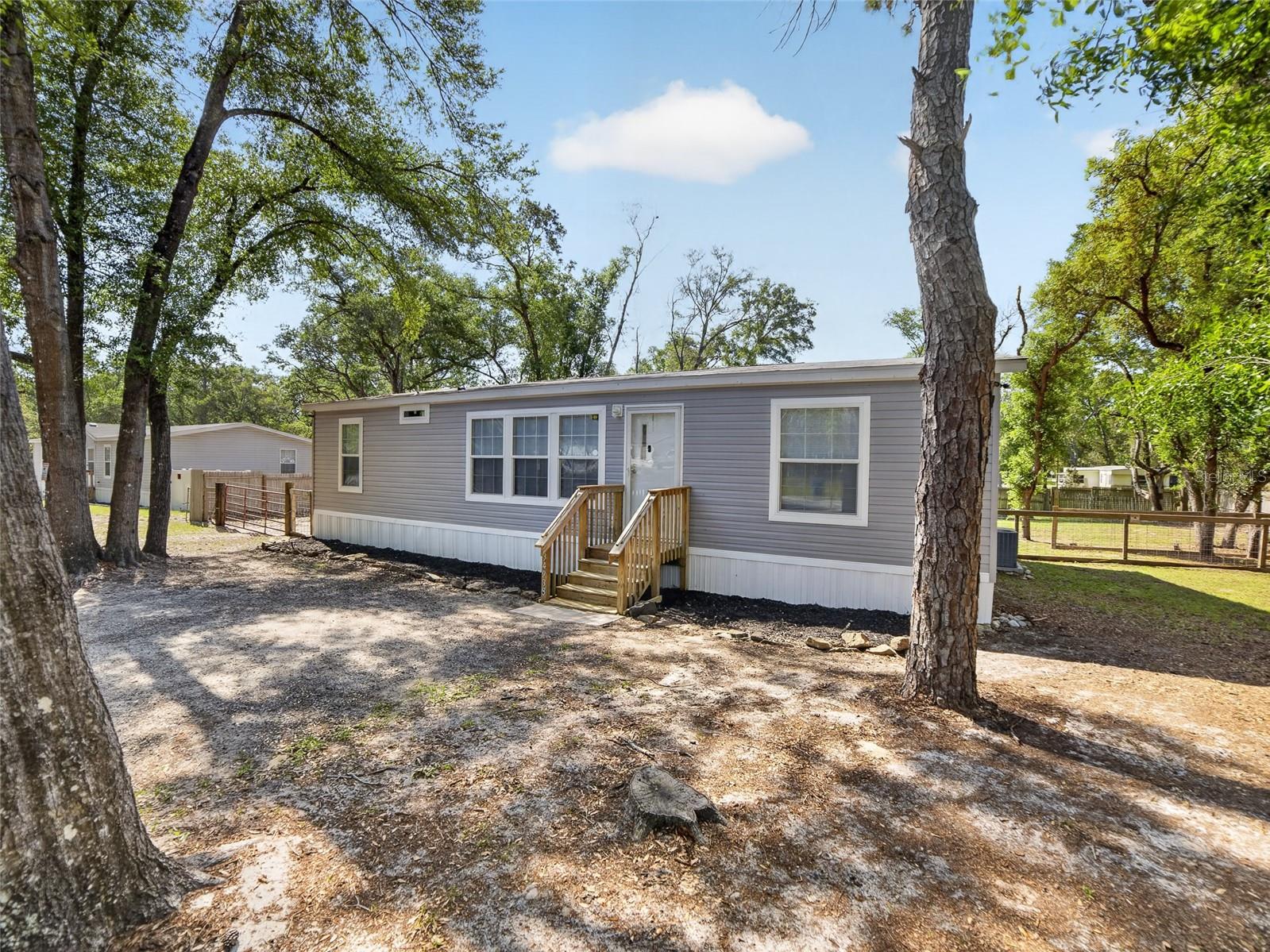 One or more photo(s) has been virtually staged. Here we have beautiful newer home on a large, fenced lot towards the end of a cul-de-sac in a peaceful neighborhood. This 3-bedroom 2-bathroom home features an open floor plan with a split bedroom layout. Great and spacious for comfort, entertaining, dining, all you could ask for in your common living areas. Light and airy all throughout with tray ceilings in the living room and crown moldings all around. All rooms are very spacious, the primary bedroom boasting an excellent walk-in closet, en-suite bathroom with separate large tub, shower, and large dual sink vanity. The kitchen is open to all the dining and living areas with a separate pantry! Stepping through the kitchen into the large laundry gains you access to the rear yard, but first you step onto the great deck out back to extend comfortable entertaining outside as well! The back yard is fully fenced and has a large gate on the east side of the property. The back yard offers endless options, playground, workshop, pool etc. This would be a great home for suited for all, new families, forever home, close to all things but enjoy some peace away from the hustle and bustle. Come get a look for yourself, this might be the home for you!